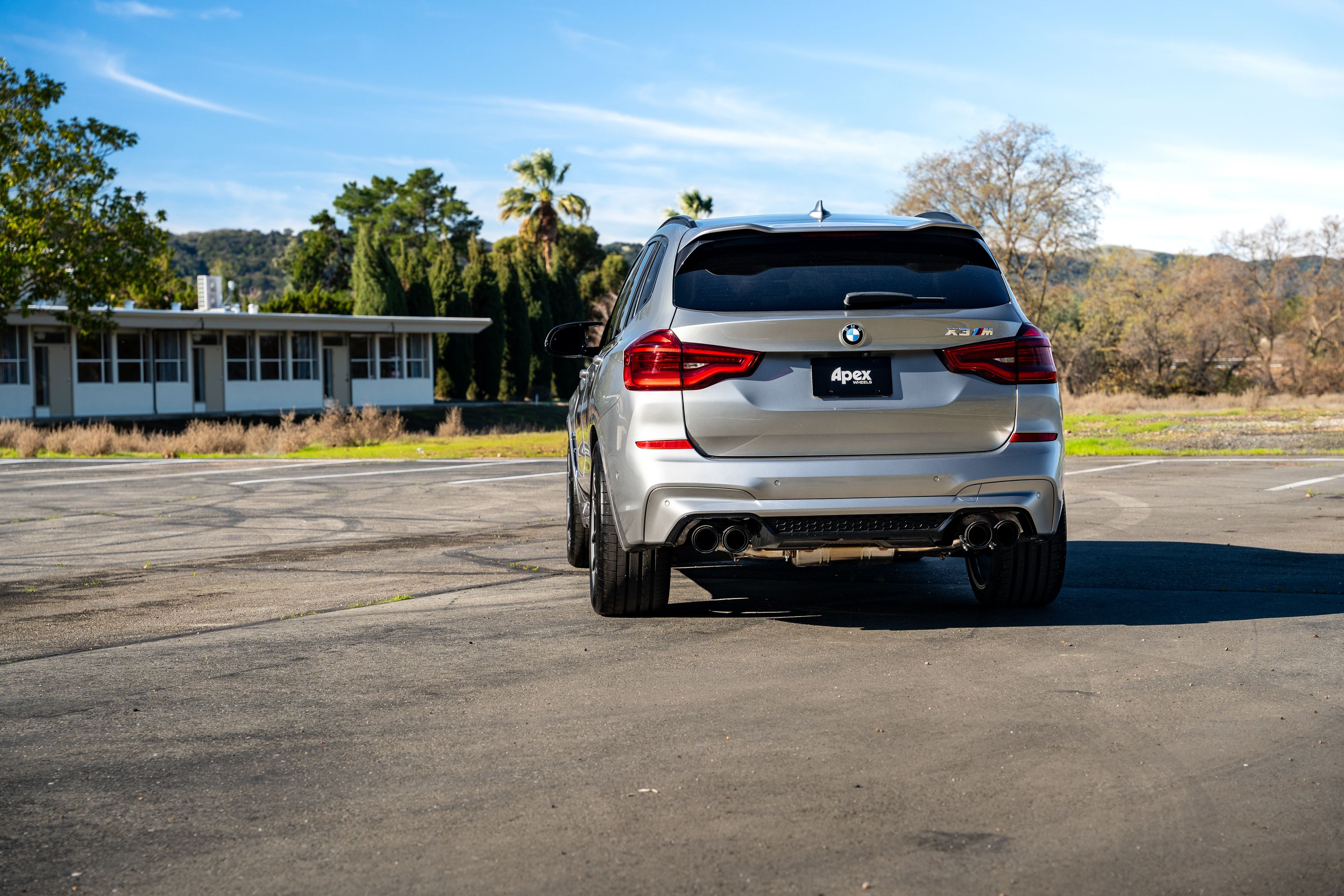 Silver BMW F97 X3M with 20" VS-5RX Apex wheels in Anthracite
