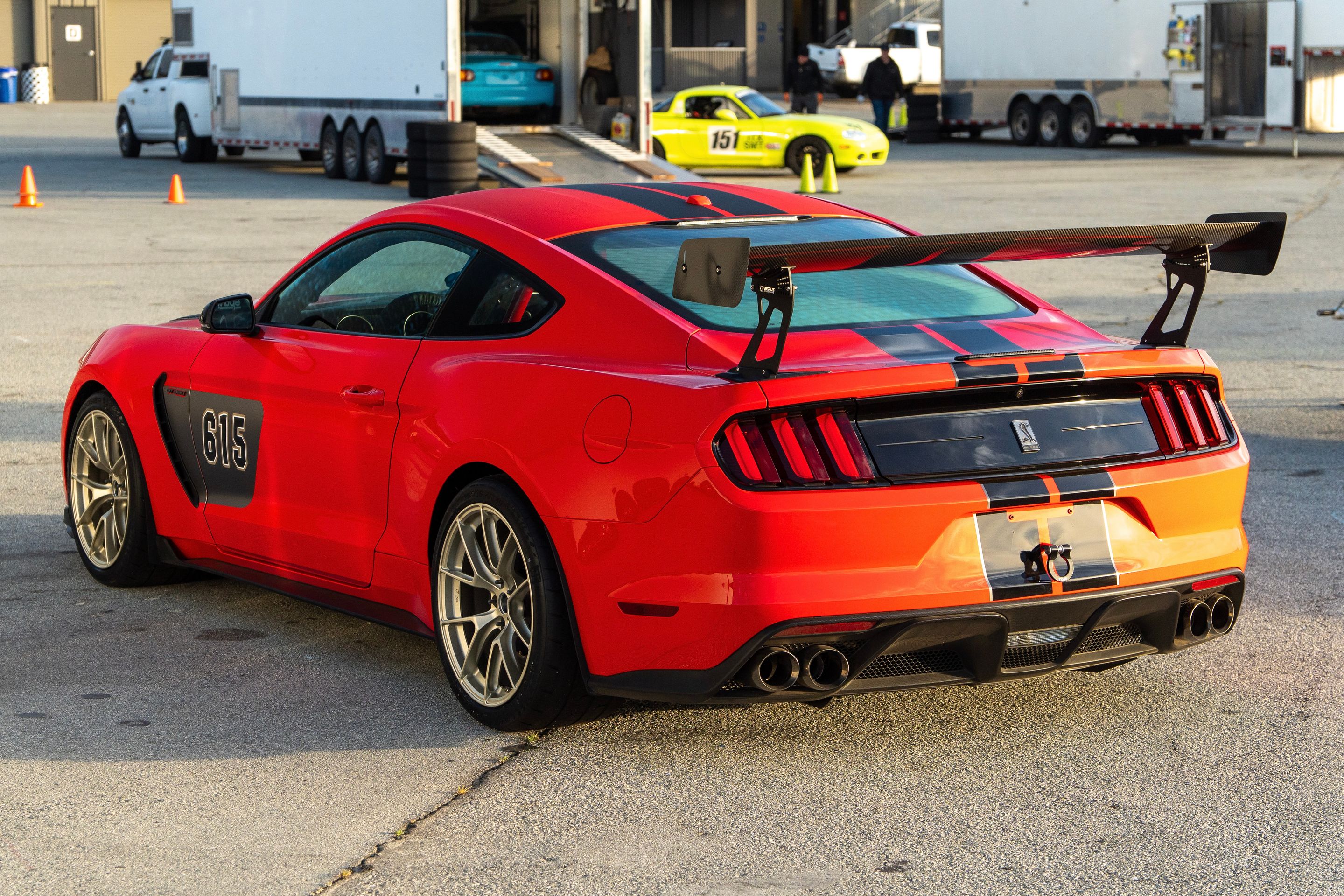 Red Ford S550 Mustang GT350 with 19" VS-5RS Apex wheels in Motorsport Gold