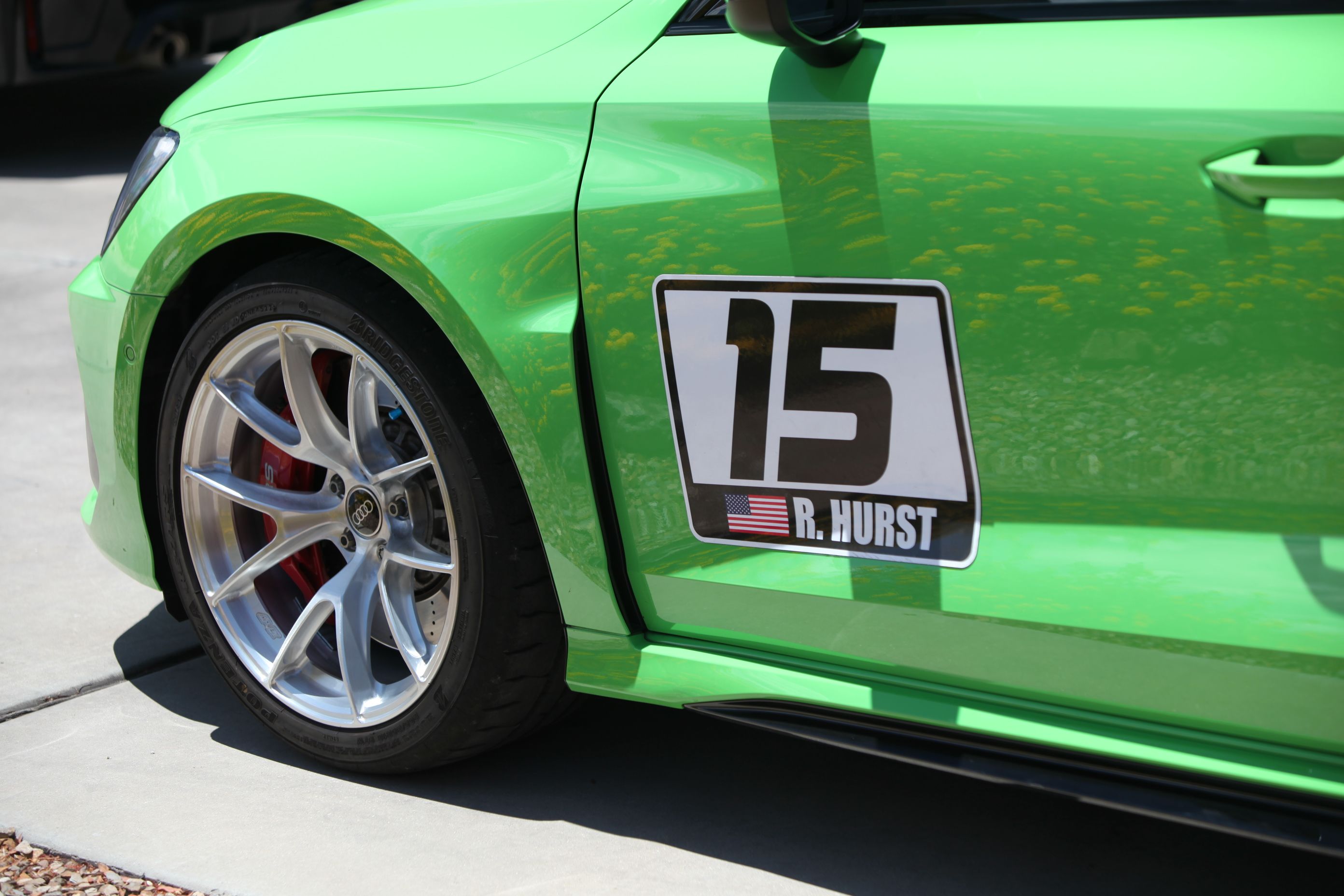 Green Audi 8Y RS 3 with 18" VS-5RS Apex wheels in Brushed Clear
