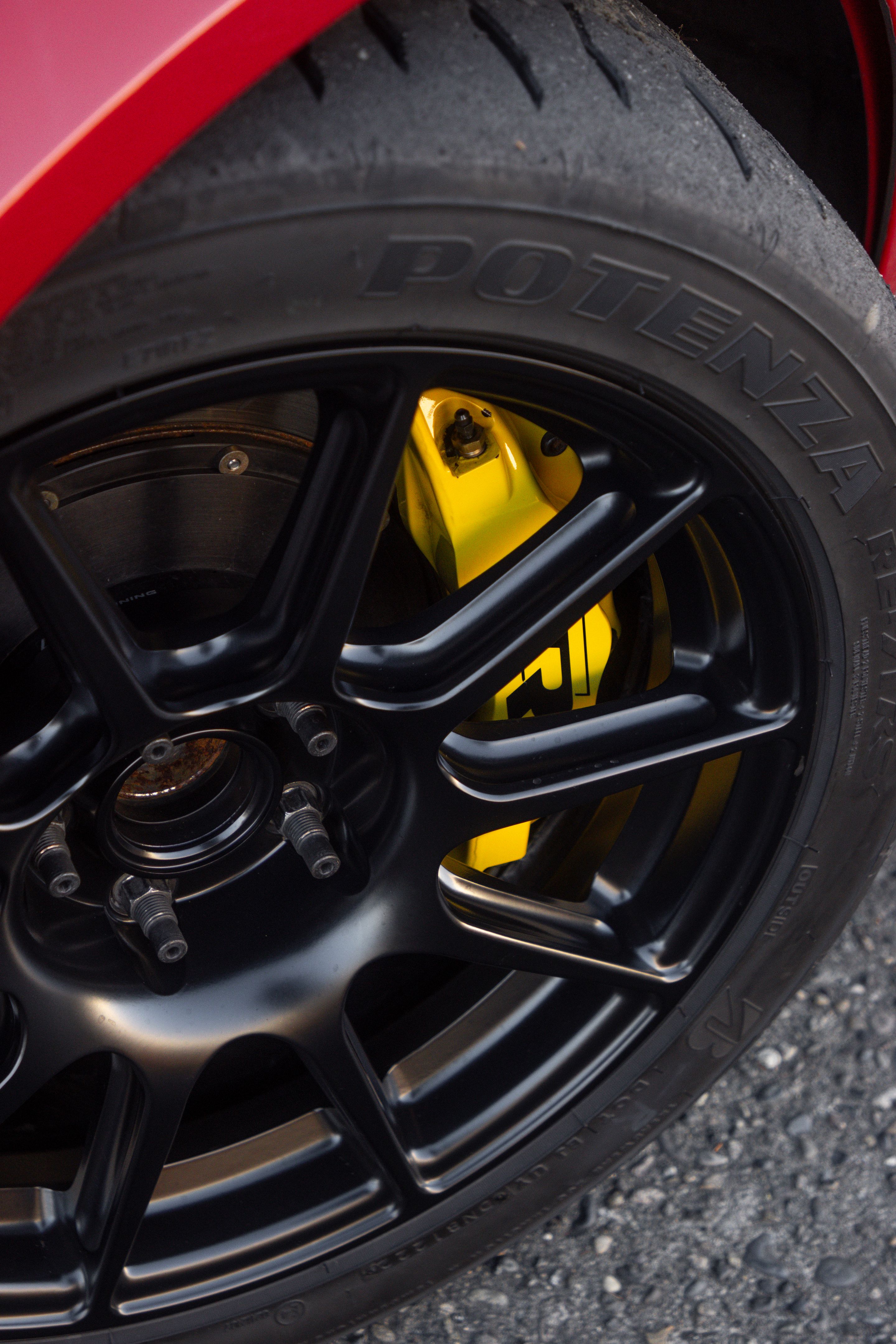 Red VW MK5 Golf with 17" SM-10 Apex wheels in Satin Black