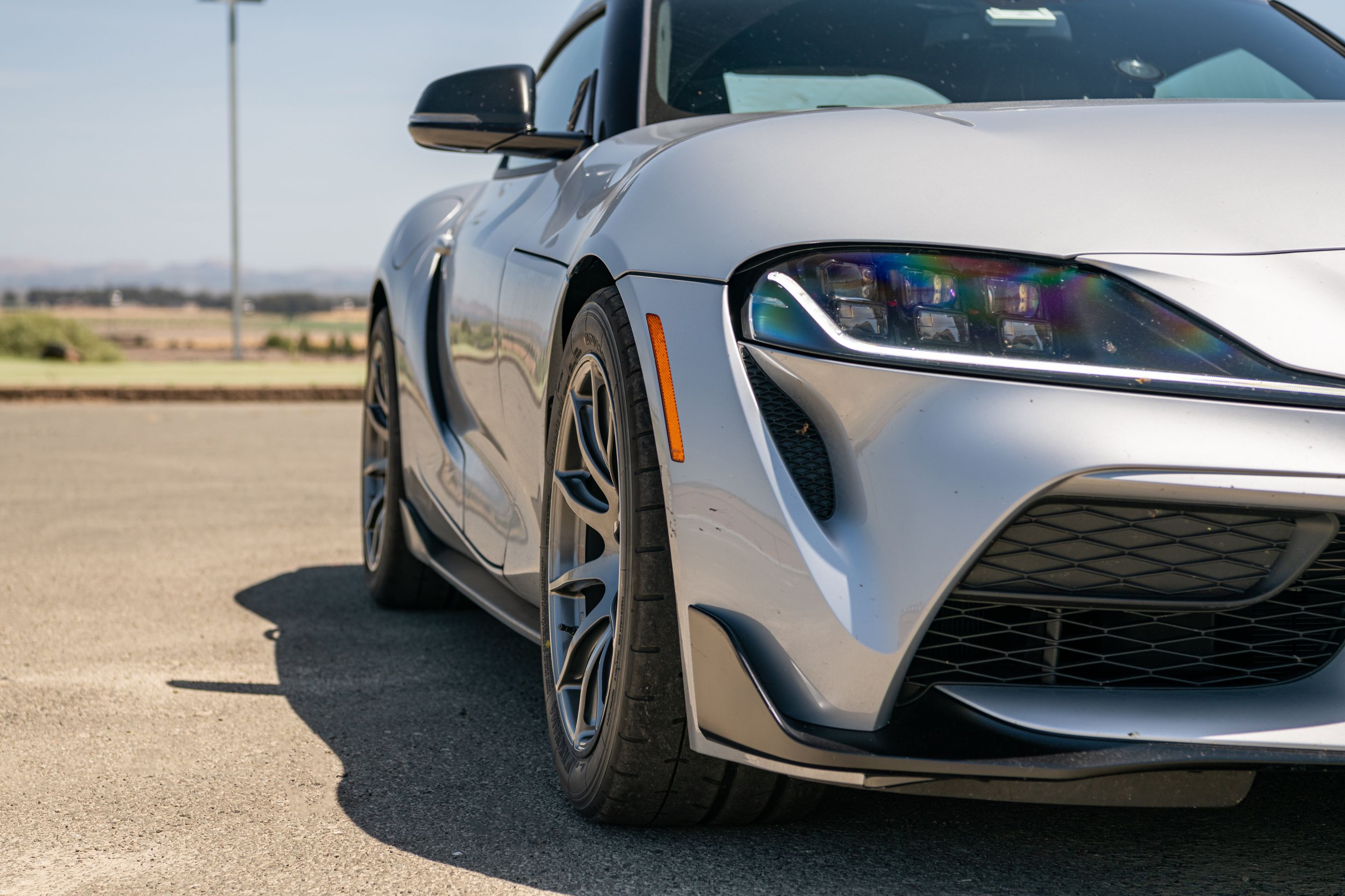 Silver Toyota GR Supra with 18" SM-10 Apex wheels in Anthracite