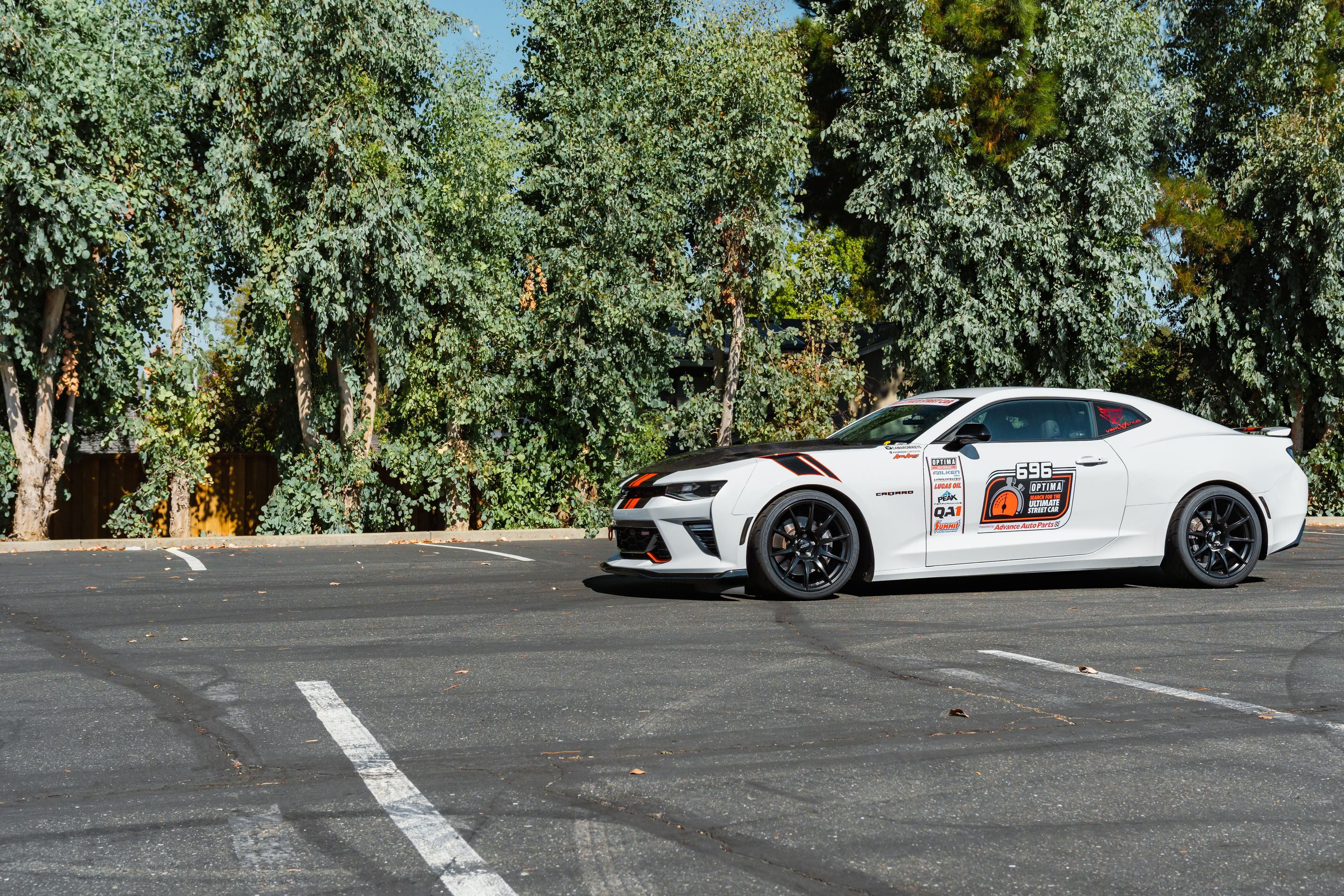 White Chevrolet 6th Gen Camaro SS with 19" SM-10 Apex wheels in Satin Black