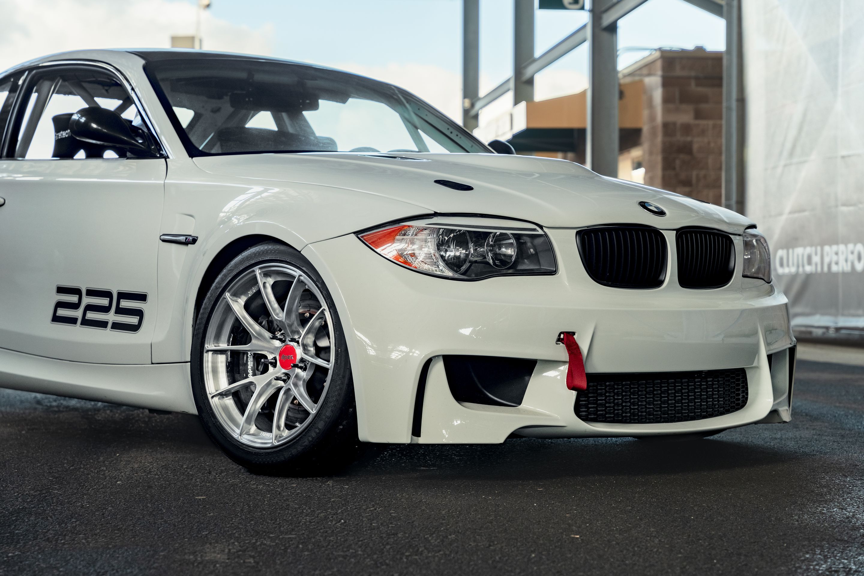 White BMW E82 1M with 18" VS-5RS Apex wheels in Brushed Clear