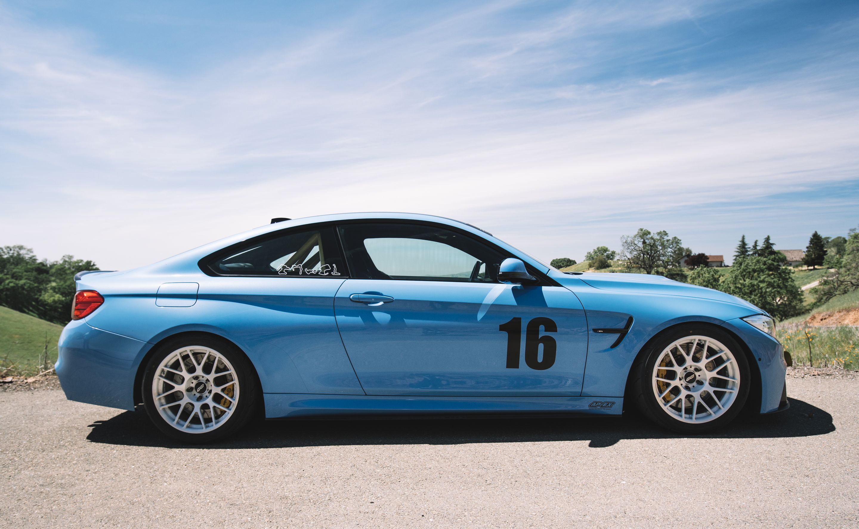 Blue BMW F82 Coupe M4 with 18" ARC-8R Apex wheels in Brushed Clear