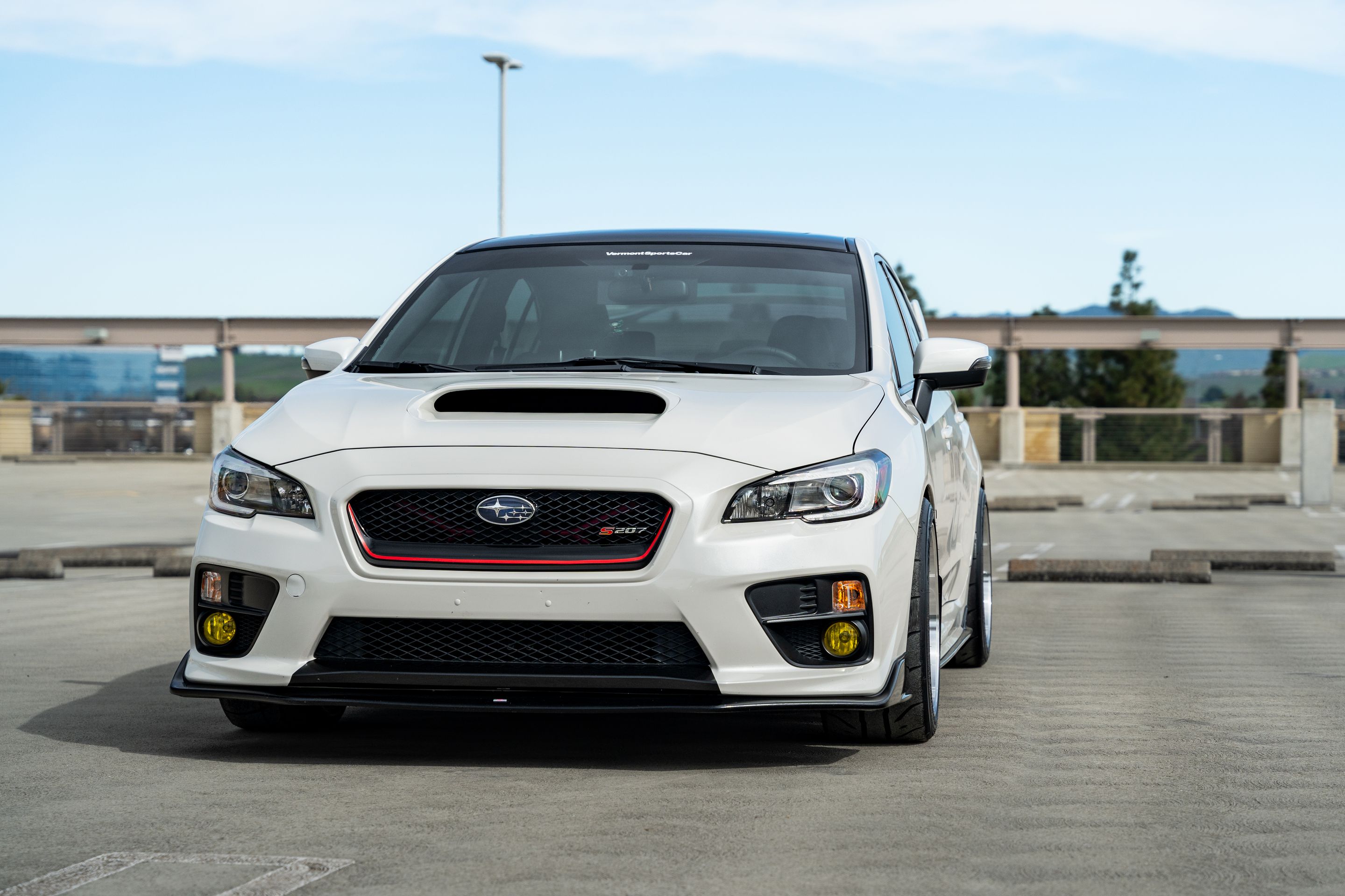 White Subaru VA WRX STI with 18" ML-10RT Apex wheels in Machined Lip Anthracite