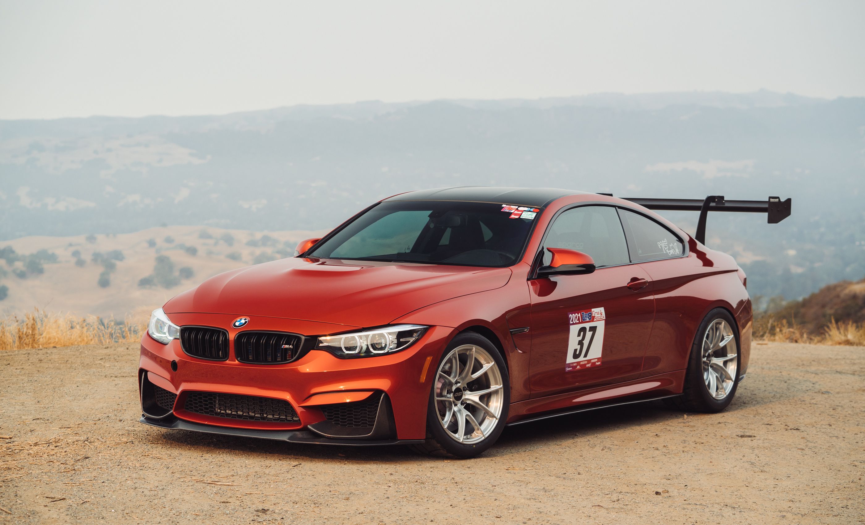 Orange BMW F82 Coupe M4 with 18" VS-5RS Apex wheels in Brushed Clear