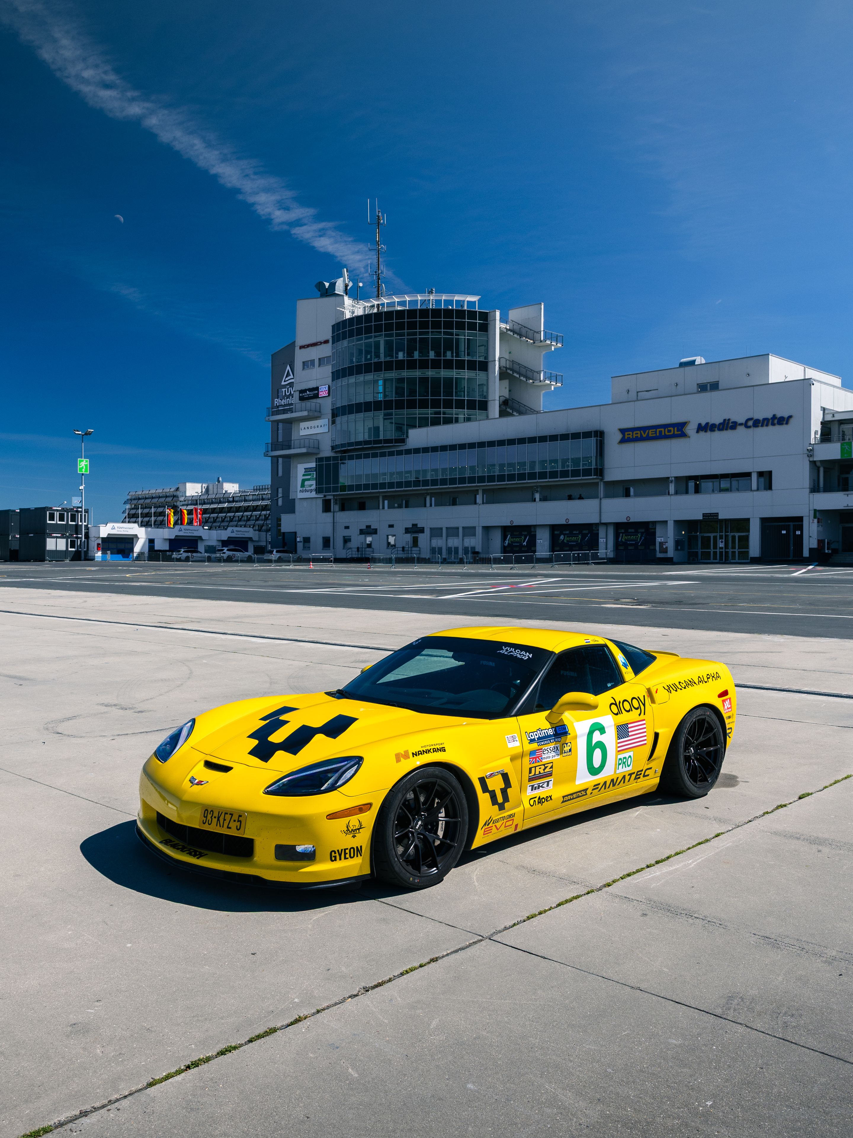 Yellow Chevrolet C6 Corvette Z06 with 18" VS-5RS Apex wheels in Satin Black