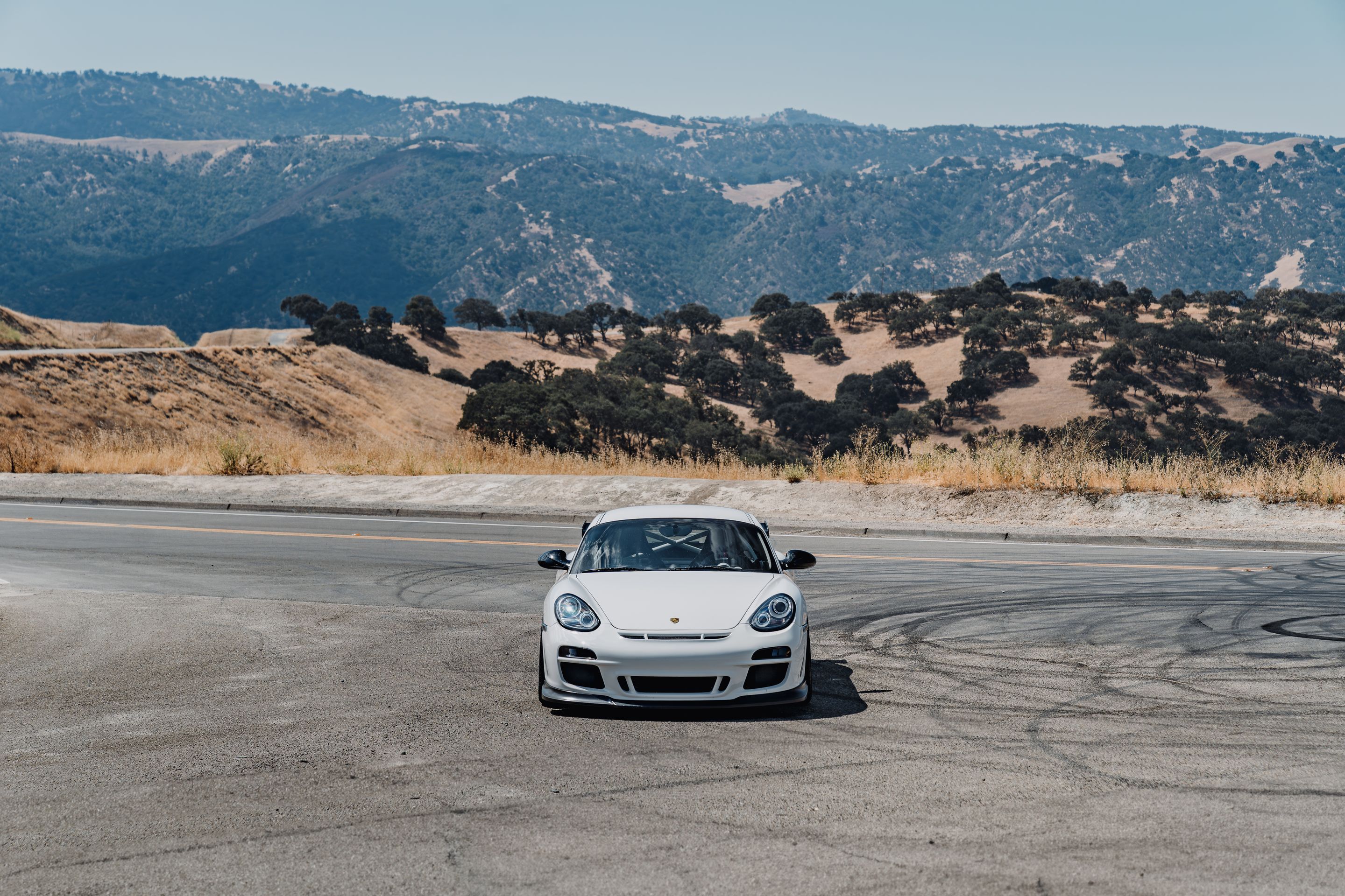 White Porsche 987 Cayman R with 18" EC-7RS Apex wheels in Race Silver