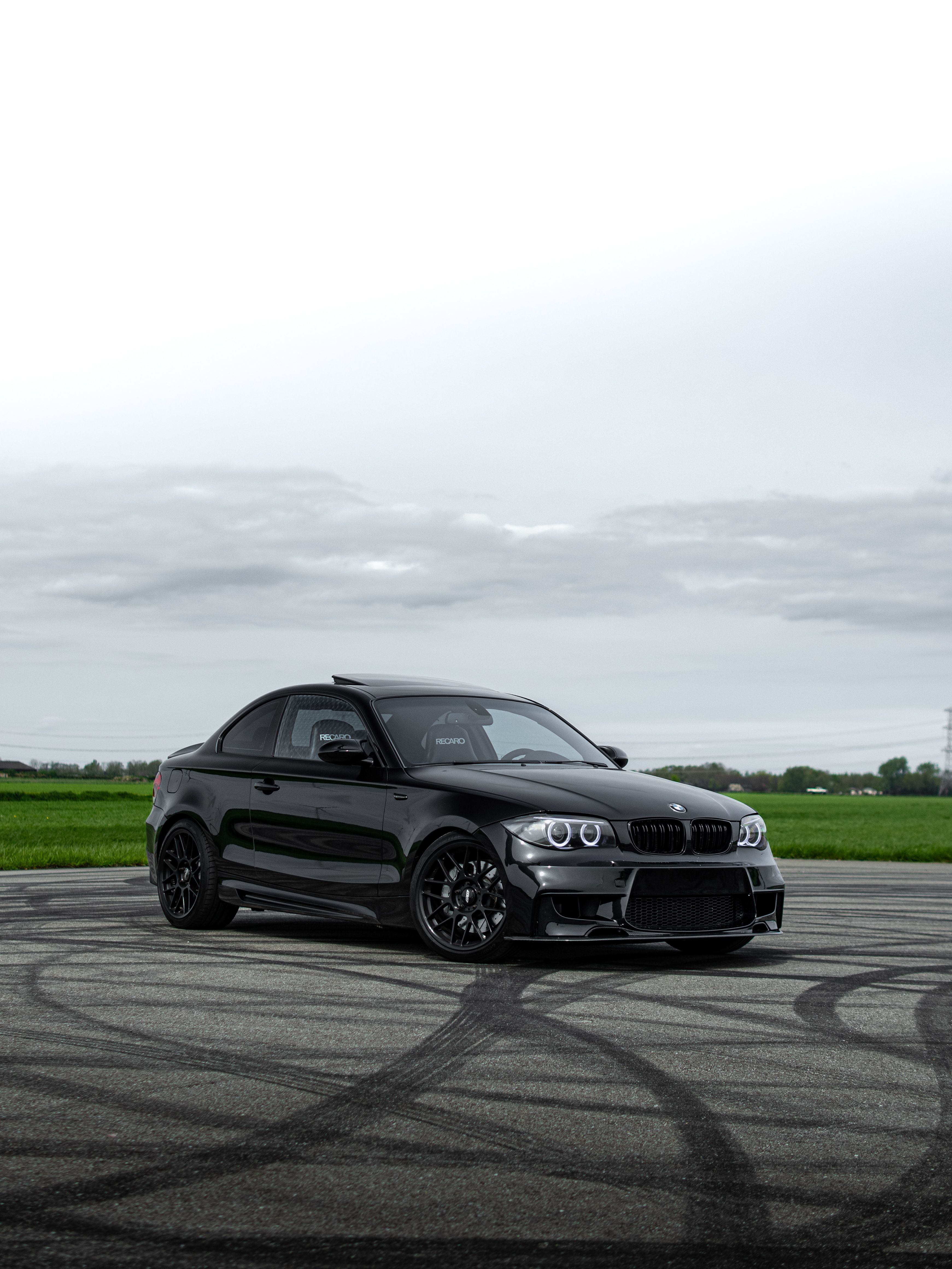 Black BMW E82 Coupe 1 Series with 18" ARC-8 Apex wheels in Satin Black