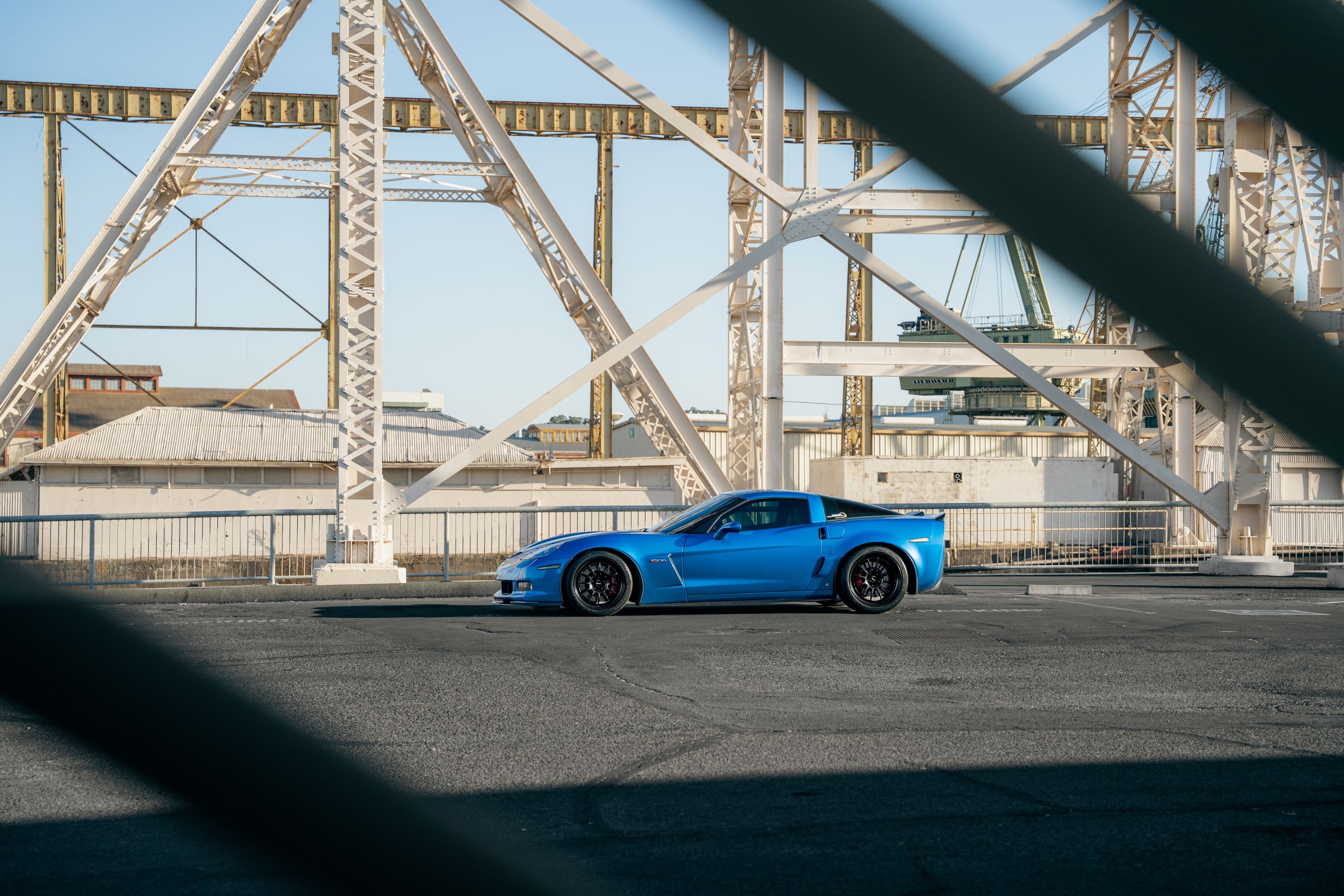 Blue Chevrolet C6 Corvette Z06 with 18"/19" TEST-S Apex wheels in Satin Black