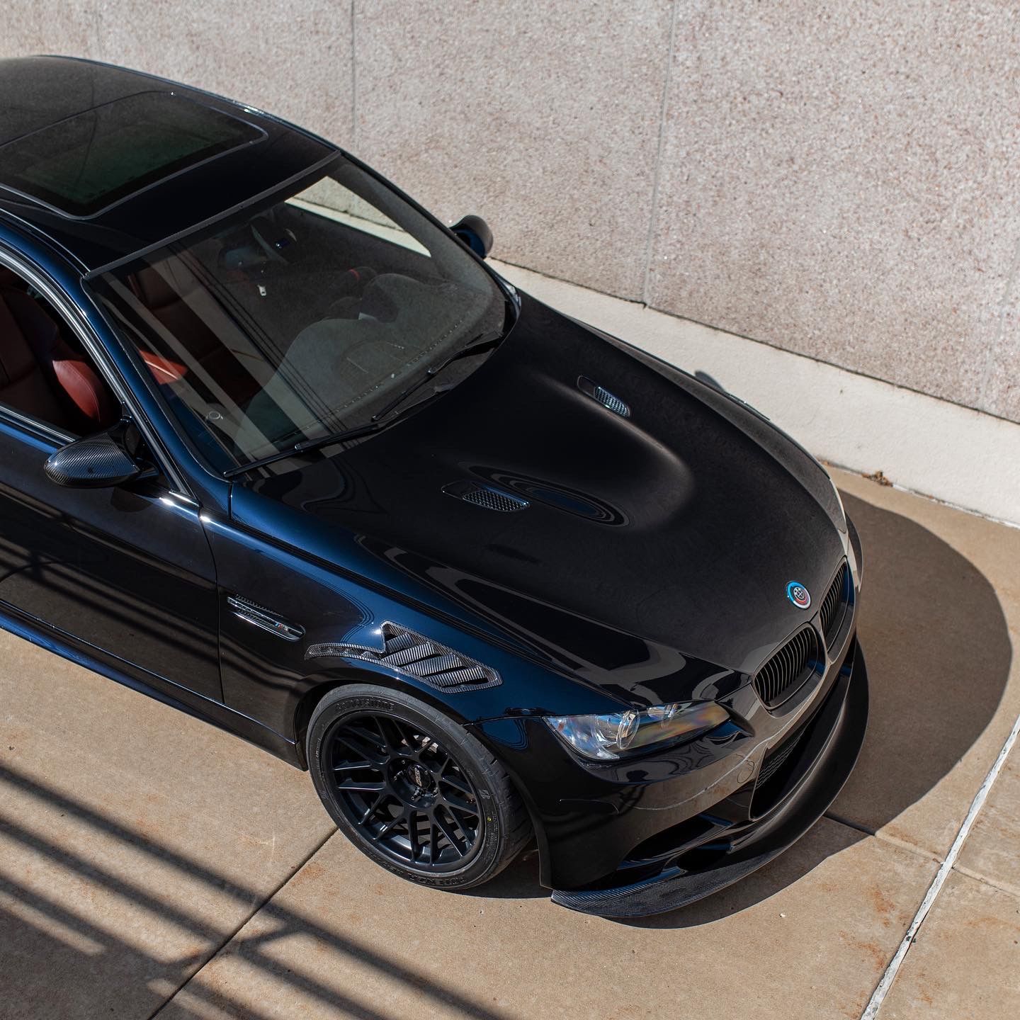 Black BMW E90 Sedan M3 with 18" ARC-8 Apex wheels in Satin Black