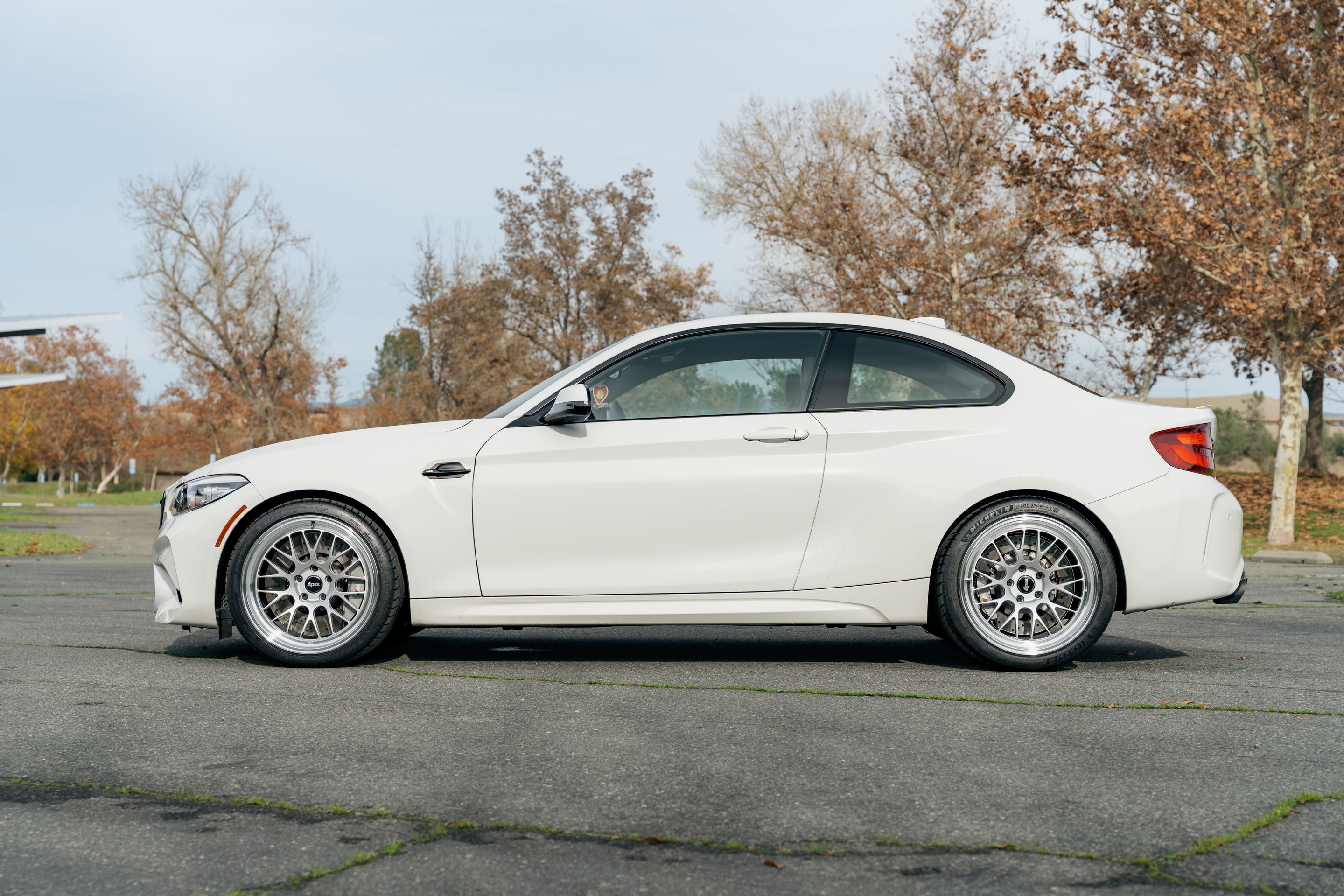 White BMW F87 M2 with 19" ML-10RT Apex wheels in Machined Lip Race Silver