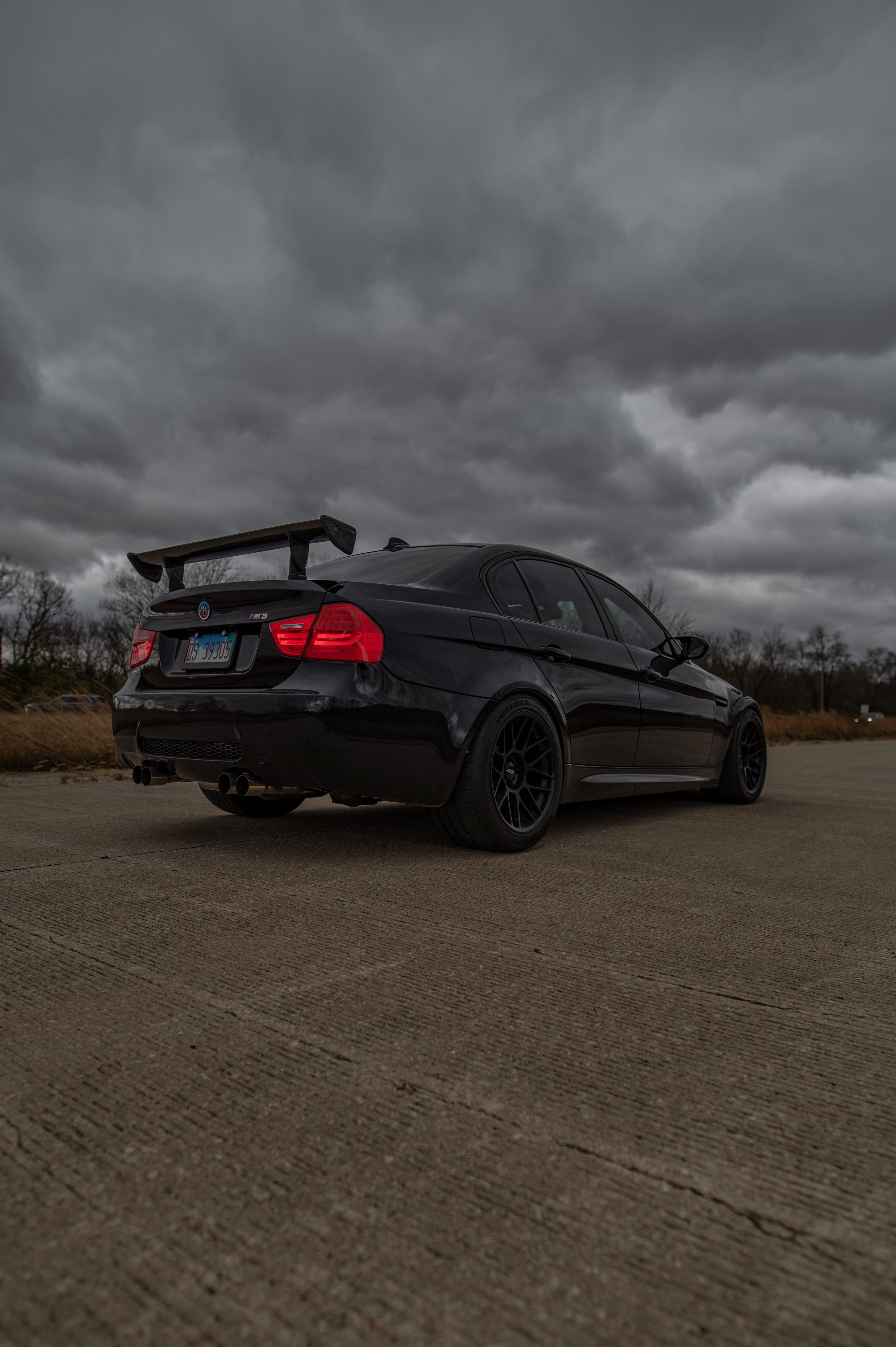 Black BMW E90 Sedan M3 with 18" ARC-8 Apex wheels in Satin Black