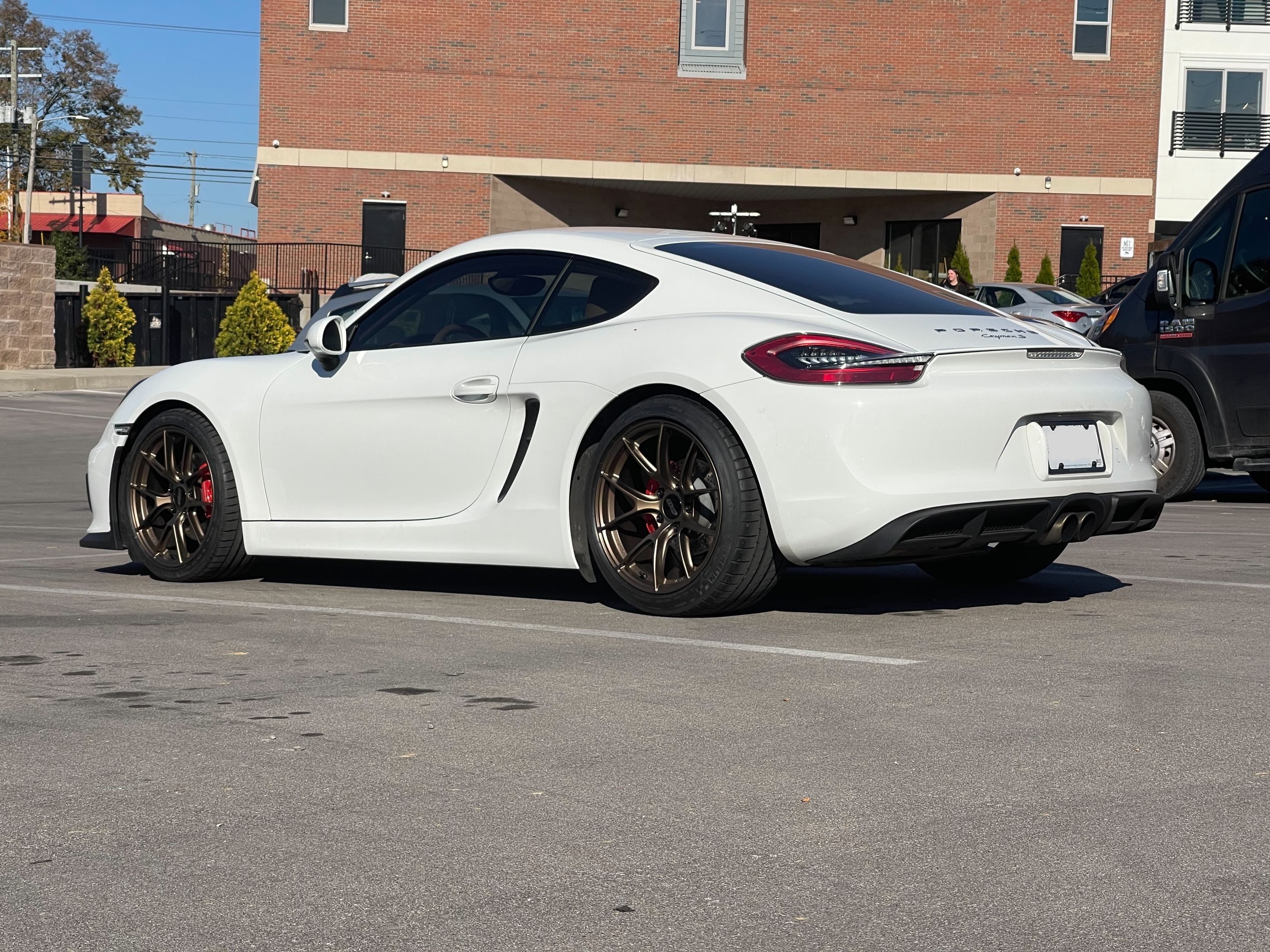 White Porsche 981 Cayman S with 19" VS-5RS Apex wheels in Satin Bronze