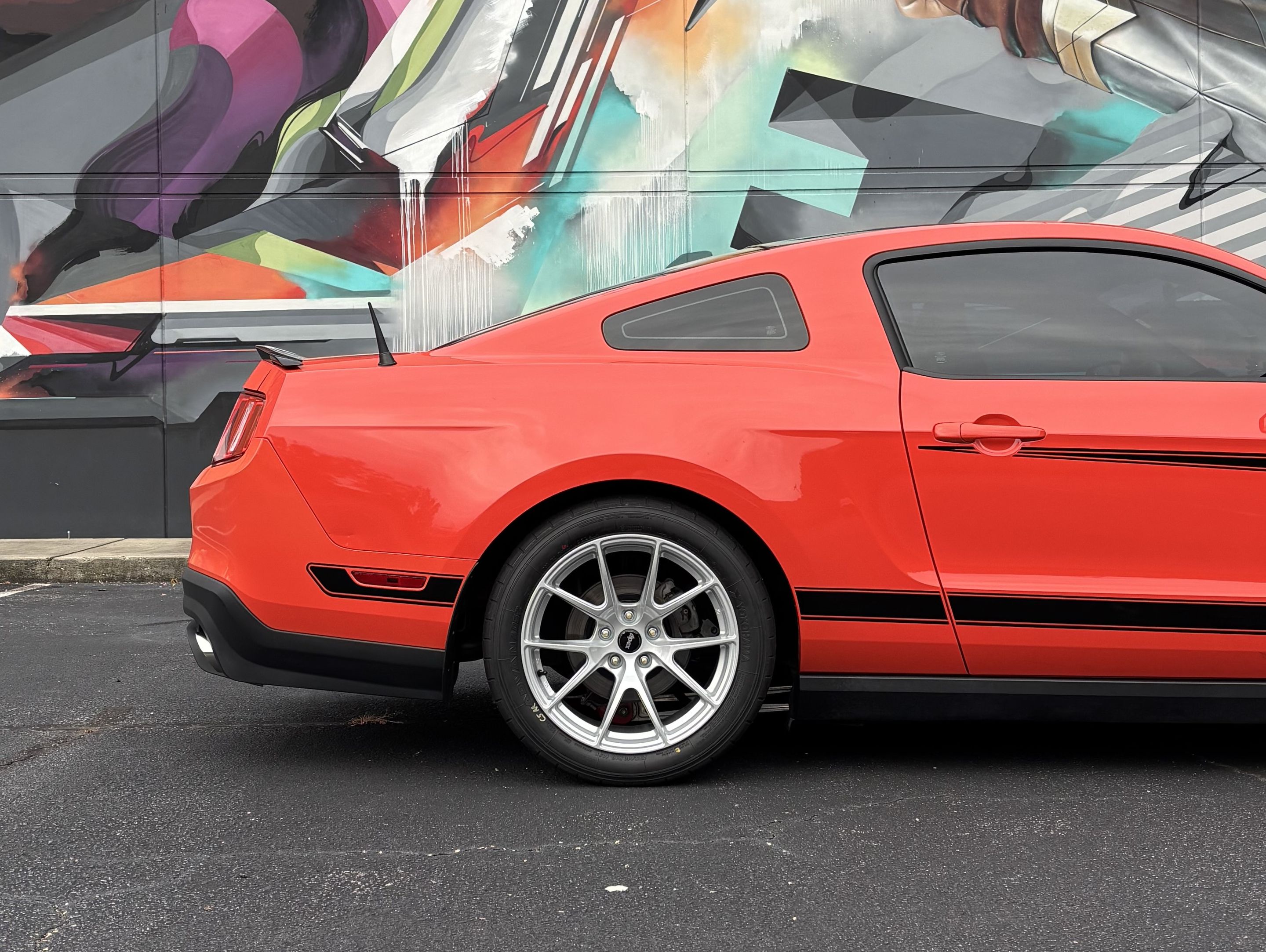 Red Ford S197 Mustang Boss 302 with 18" VS-5 Apex wheels in Race Silver