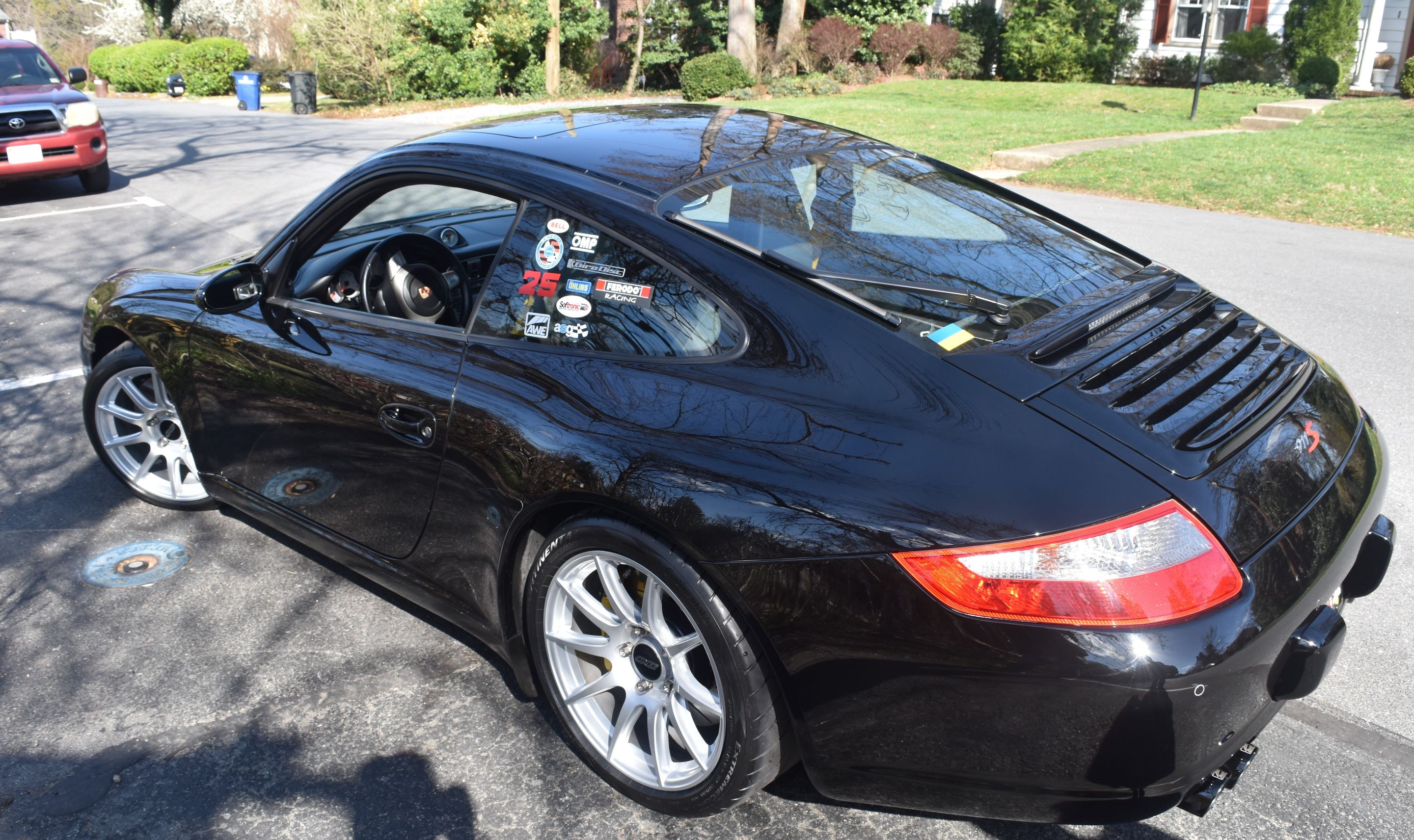 Black Porsche 911 997 Carrera S with 18" SM-10 Apex wheels in Race Silver
