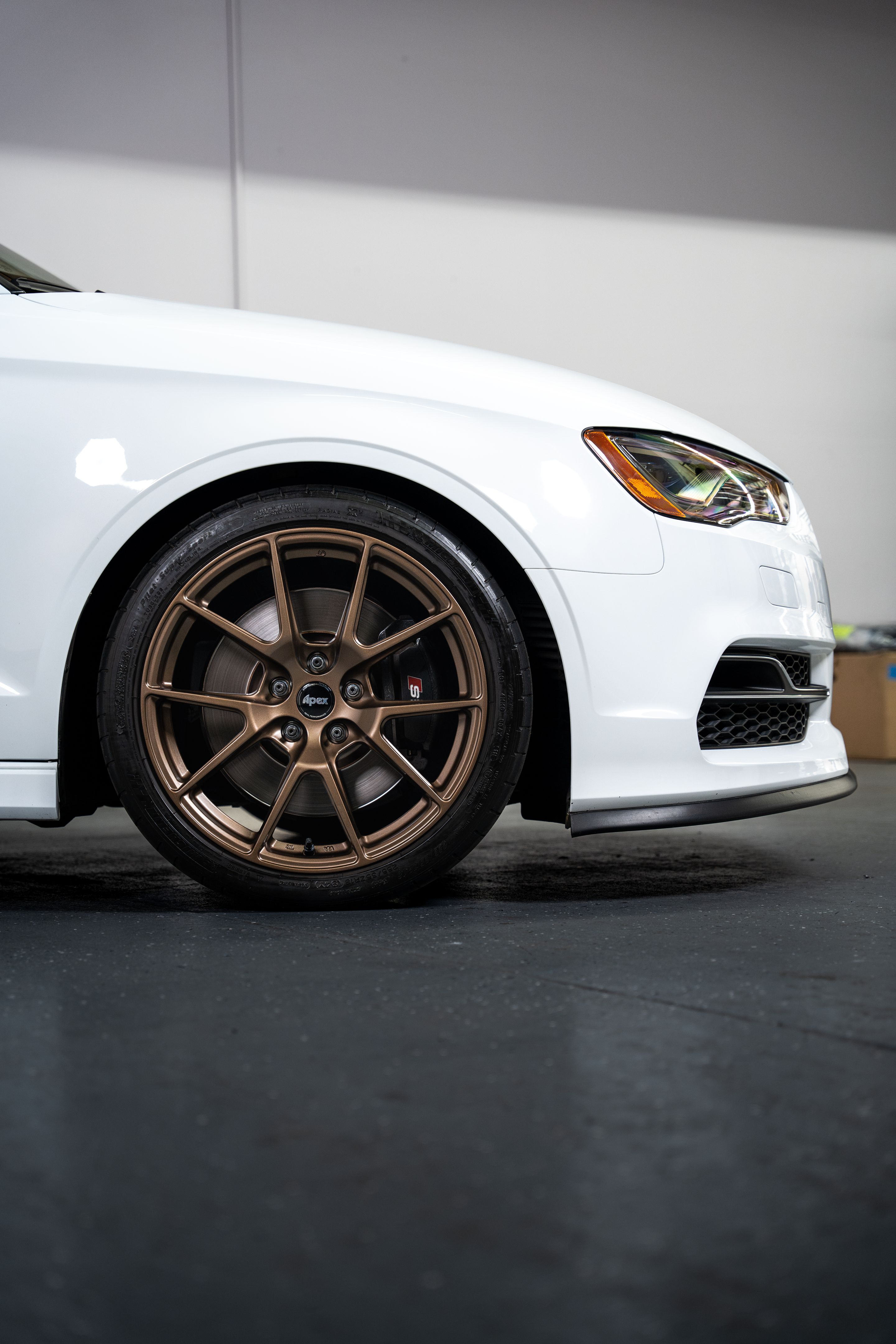 White Audi 8V S3 with 18" VS-5 Apex wheels in Satin Bronze