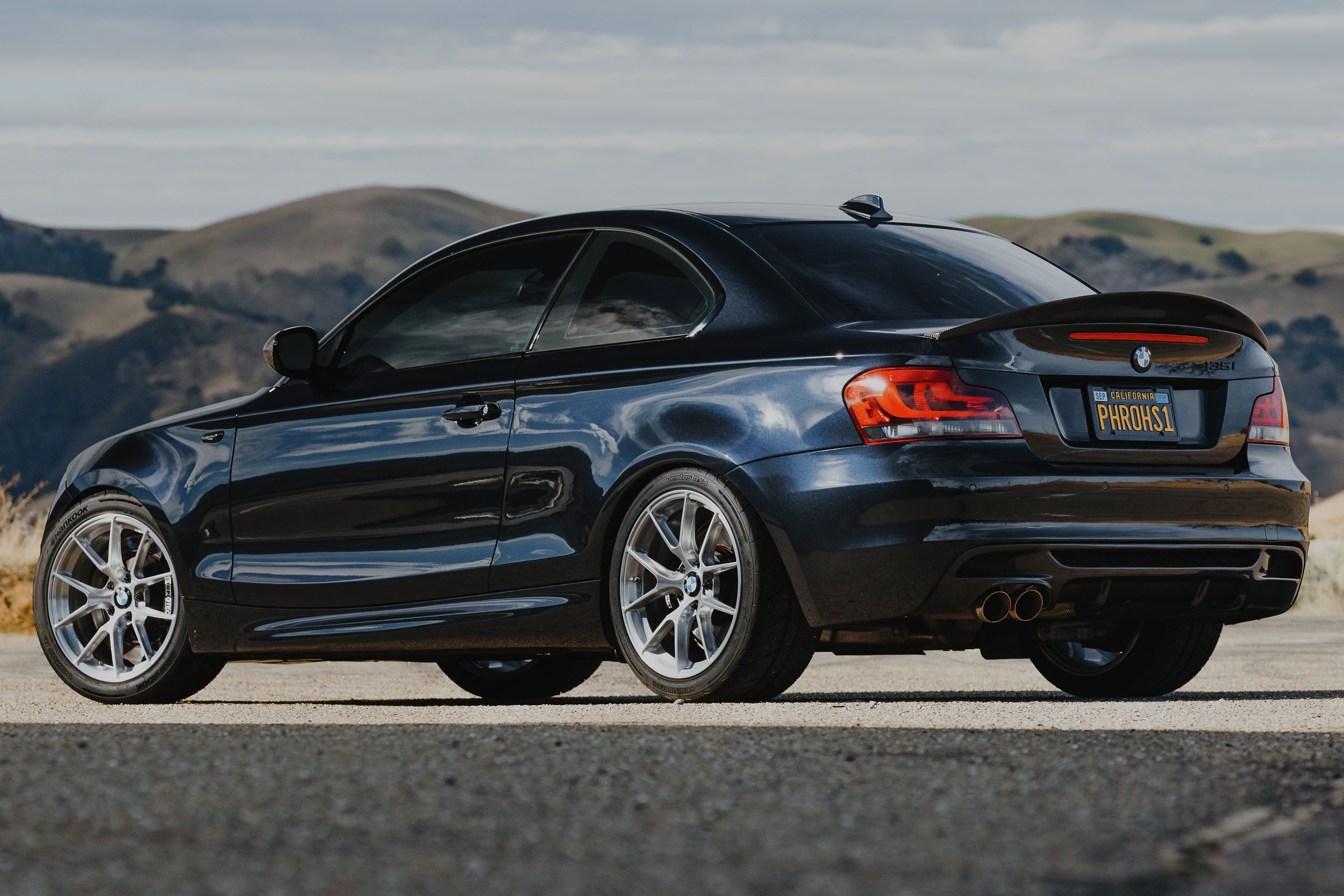 Black BMW E82 Coupe 1 Series with 18" VS-5RS Apex wheels in Brushed Clear