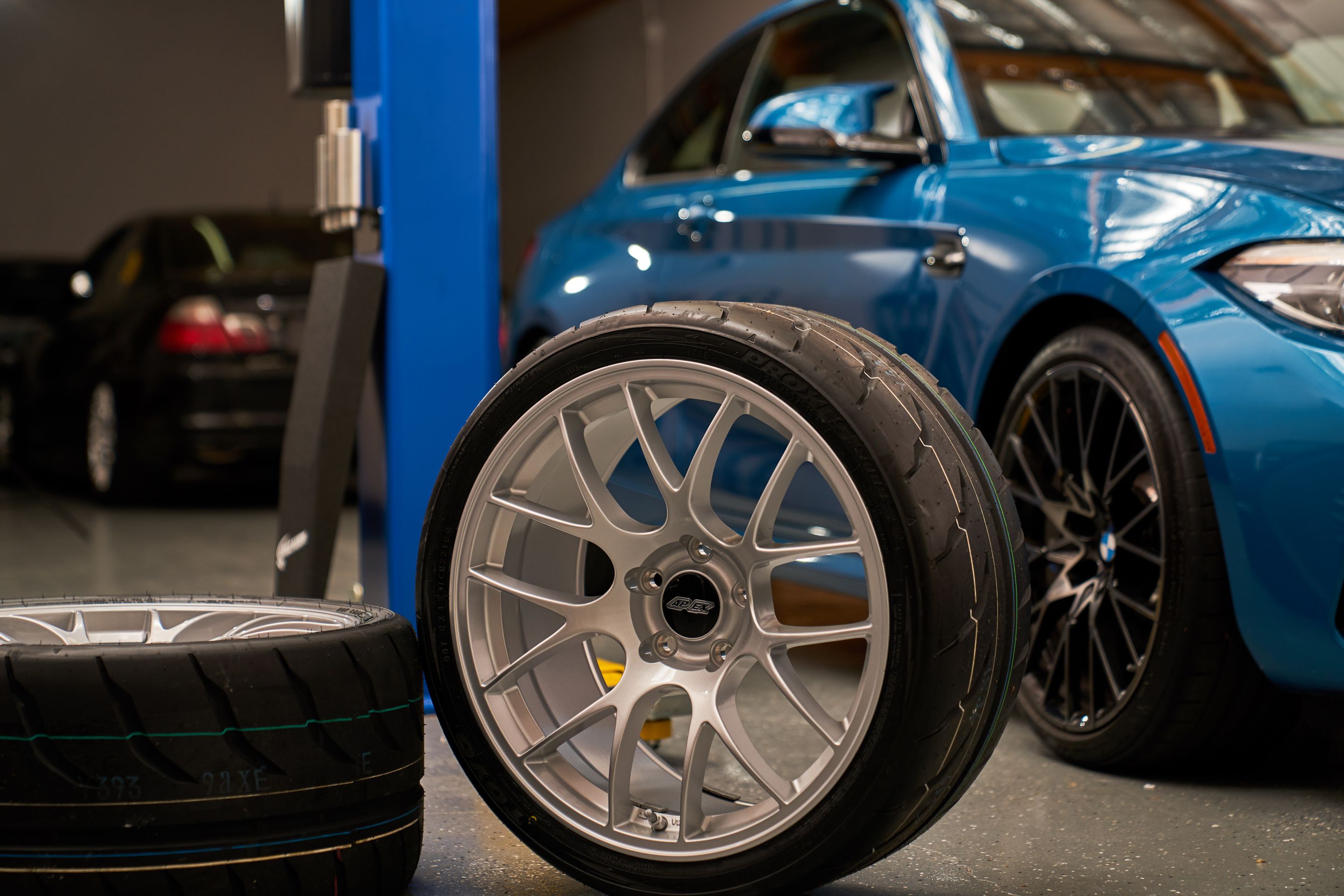 Blue BMW F87 M2 with 19" EC-7 Apex wheels in Race Silver