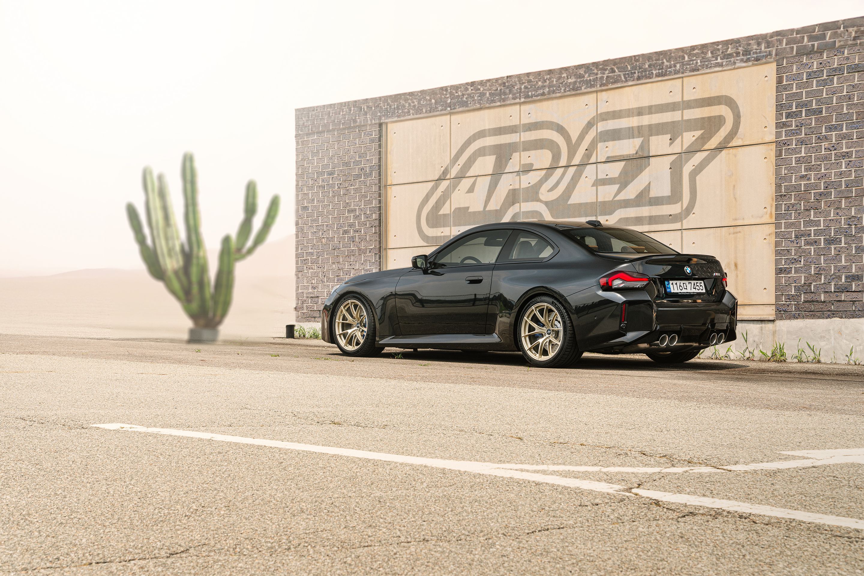 Black BMW G87 M2 with 19" VS-5RS Apex wheels in Motorsport Gold