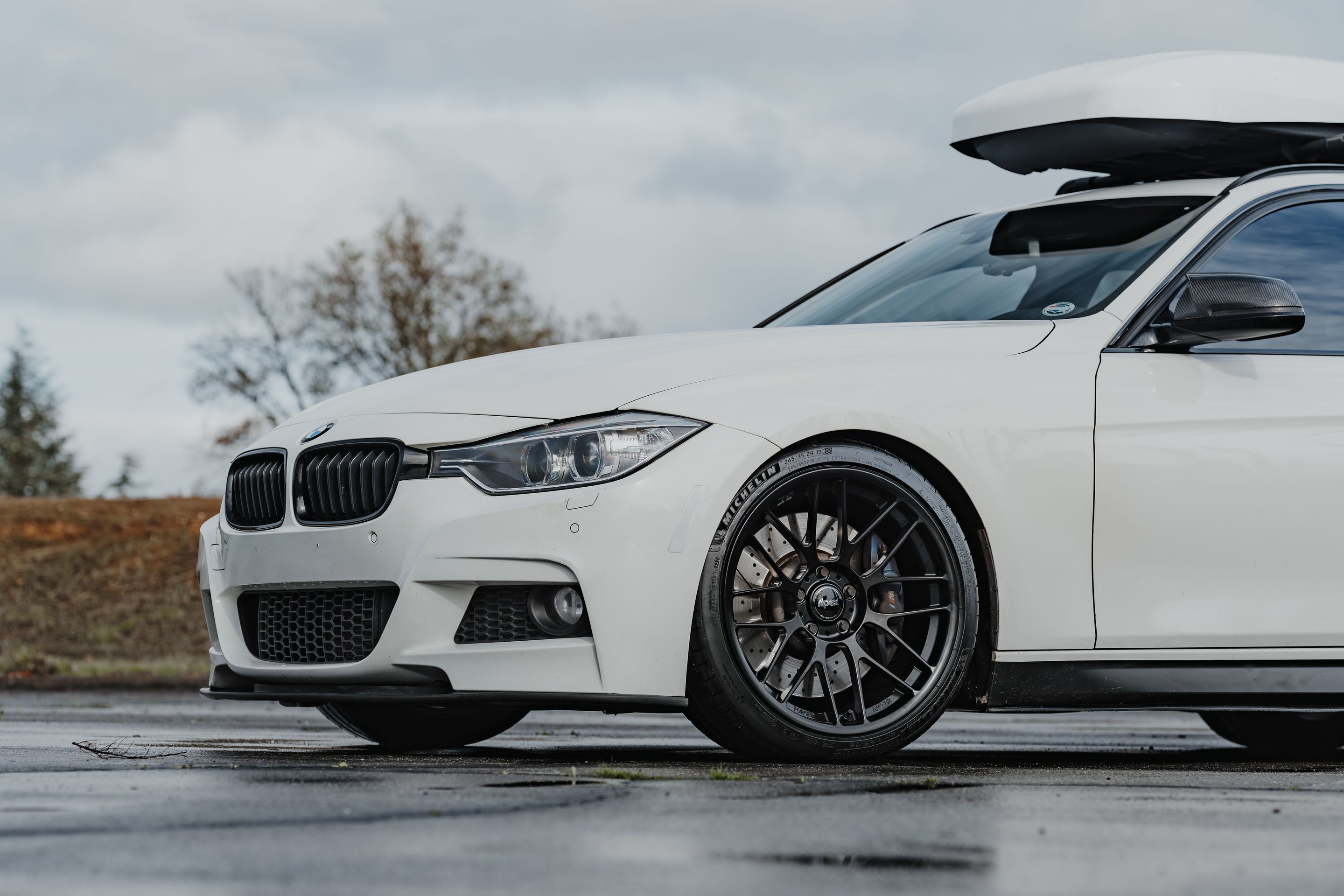 White BMW F31 Wagon 3 Series with 19" ARC-8RT Apex wheels in Satin Black