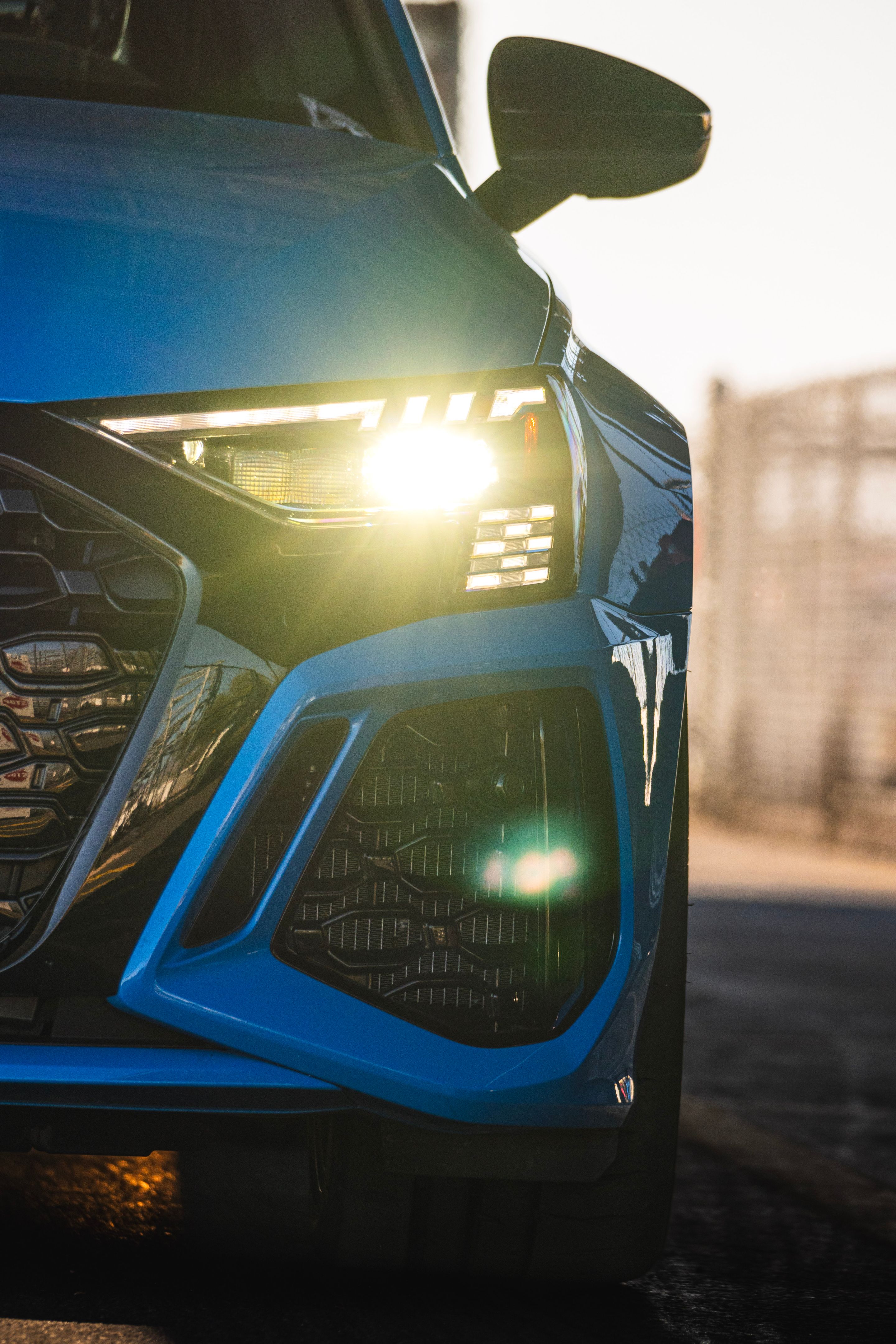 Blue Audi 8Y RS 3 with 18" VS-5RS Apex wheels in Brushed Clear