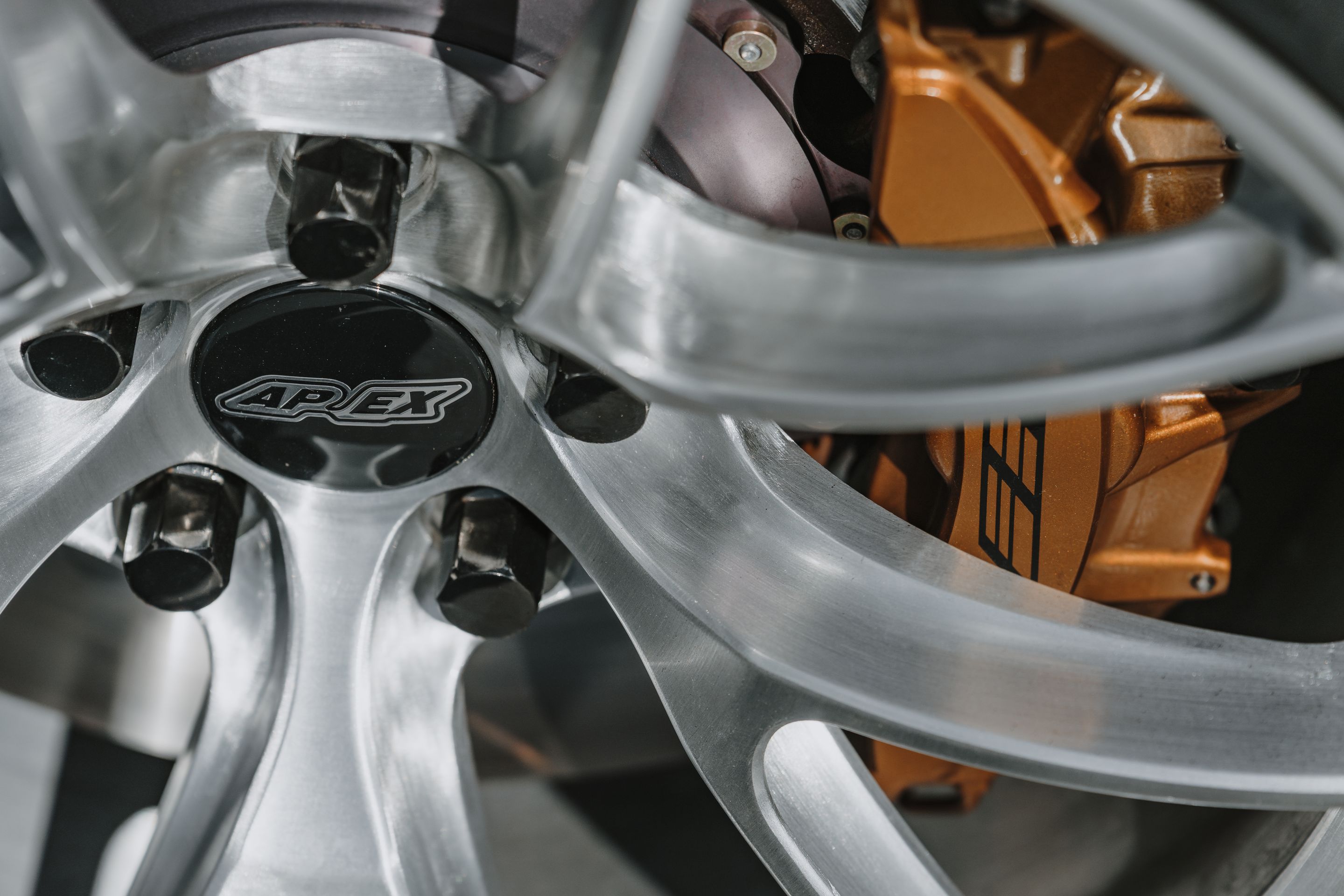 White Cadillac Gen 3 CTS-V with 20" VS-5RS Apex wheels in Brushed Clear