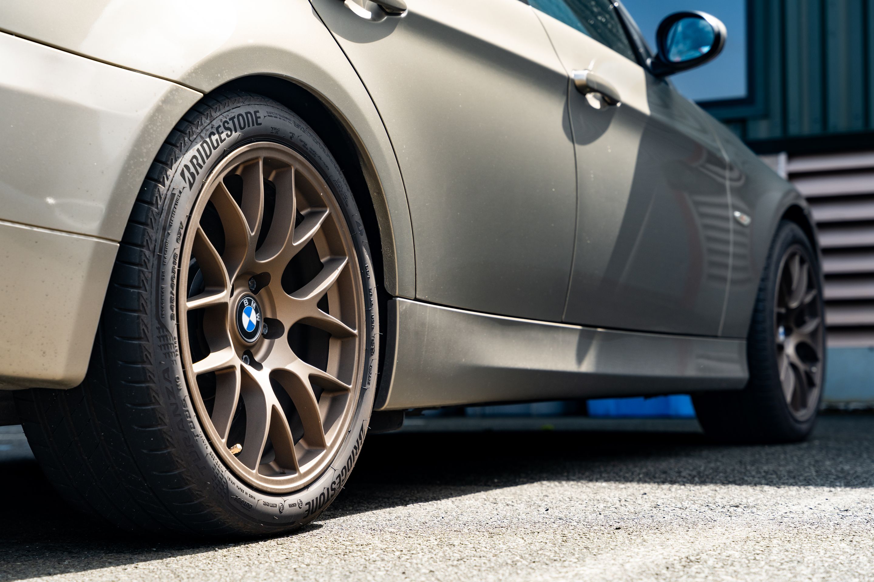 Silver BMW E90 Sedan 3 Series with 18" EC-7 Apex wheels in Satin Bronze