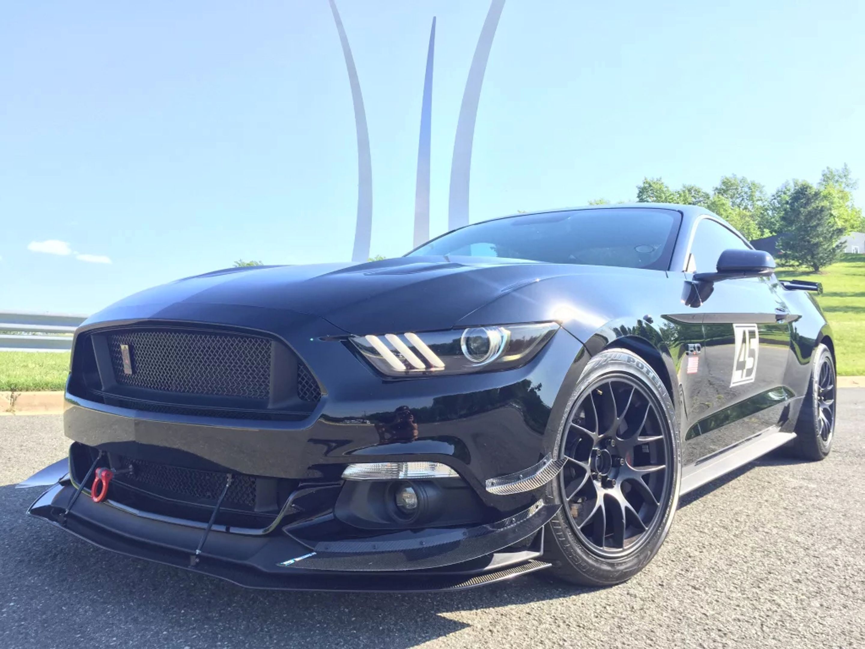 Black Ford S550 Mustang GT with 18" EC-7 Apex wheels in Satin Black