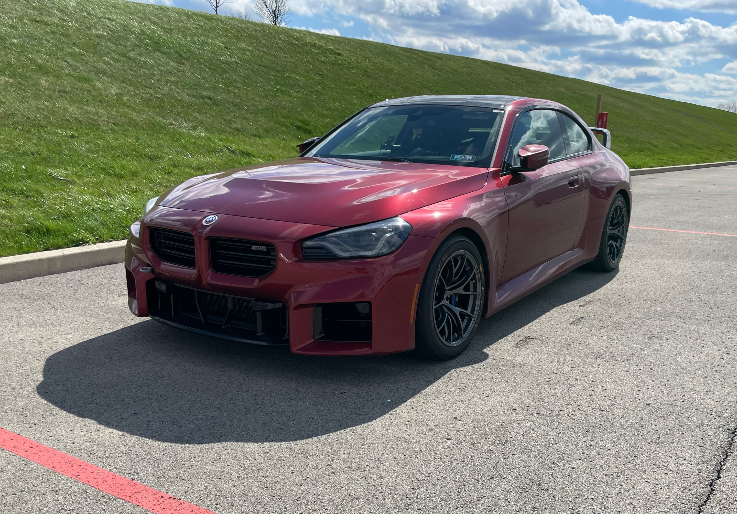 Red BMW G87 M2 with 18" VS-5RS Apex wheels in Anthracite