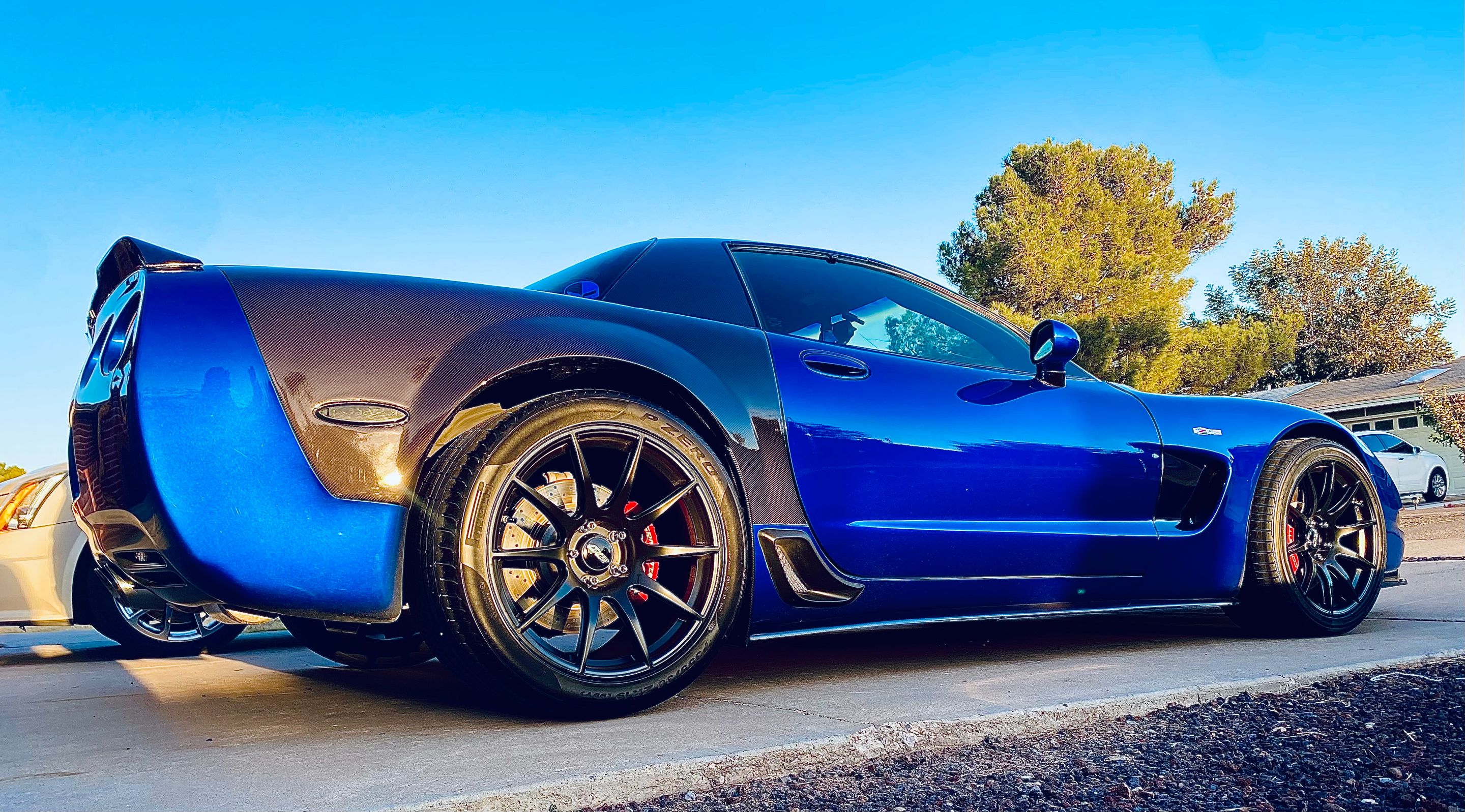 Blue Chevrolet C5 Corvette Z06 with 19" SM-10 Apex wheels in Satin Black