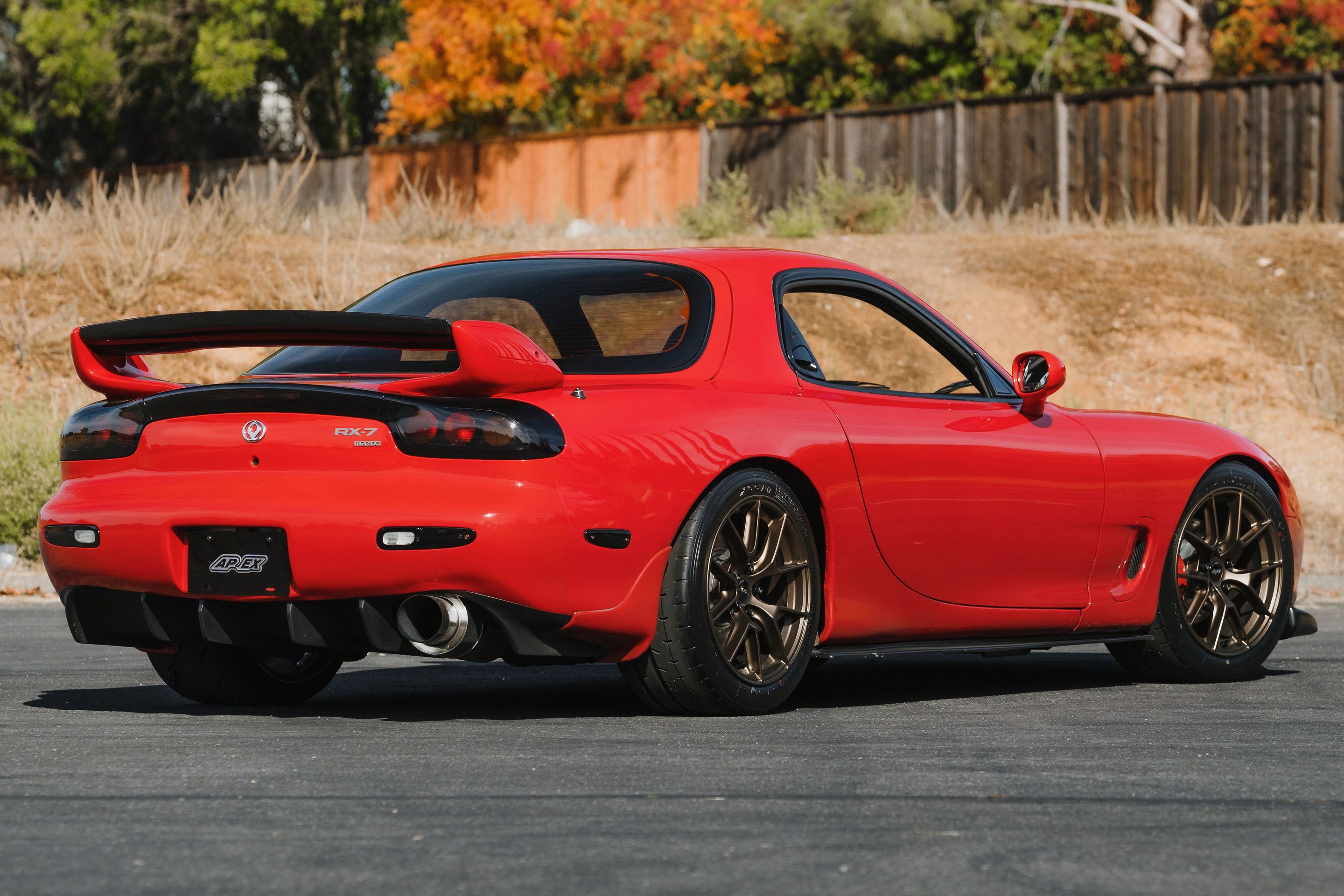 Red Mazda FD RX-7 with 17" VS-5RS Apex wheels in Satin Bronze