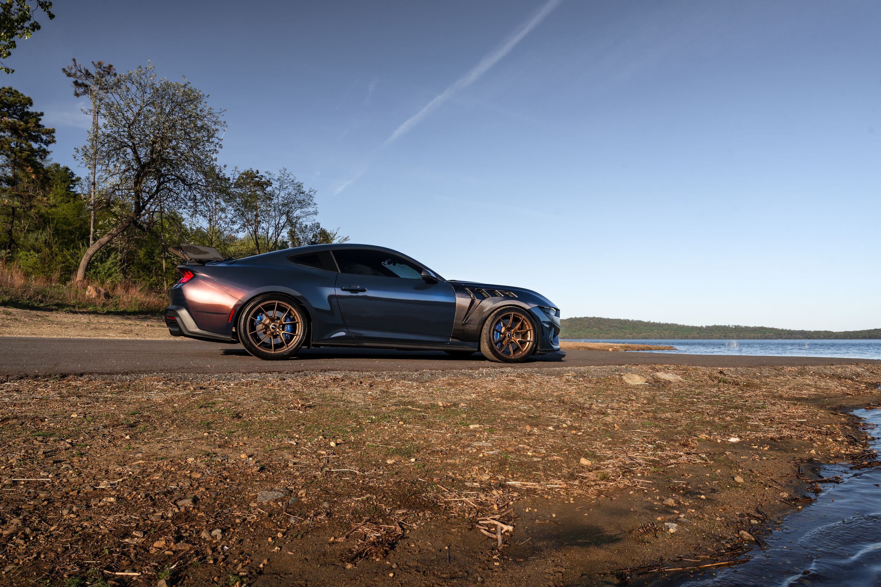 Orange Ford S650 Mustang Dark Horse with 20" VS-5RS Apex wheels in Satin Bronze