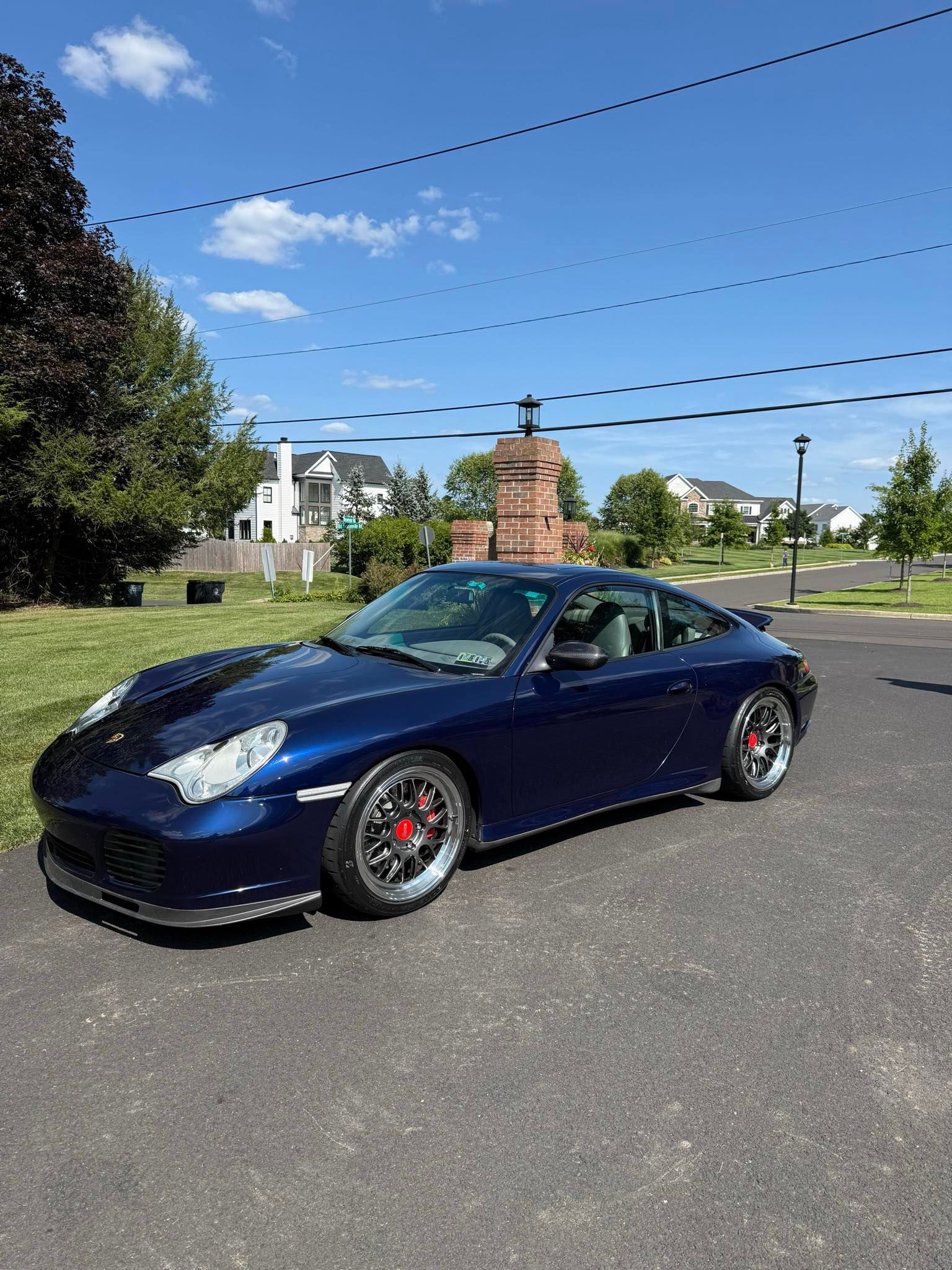 Blue Porsche 911 996 Carrera 4S with 18" ML-10RT Apex wheels in Machined Lip Anthracite