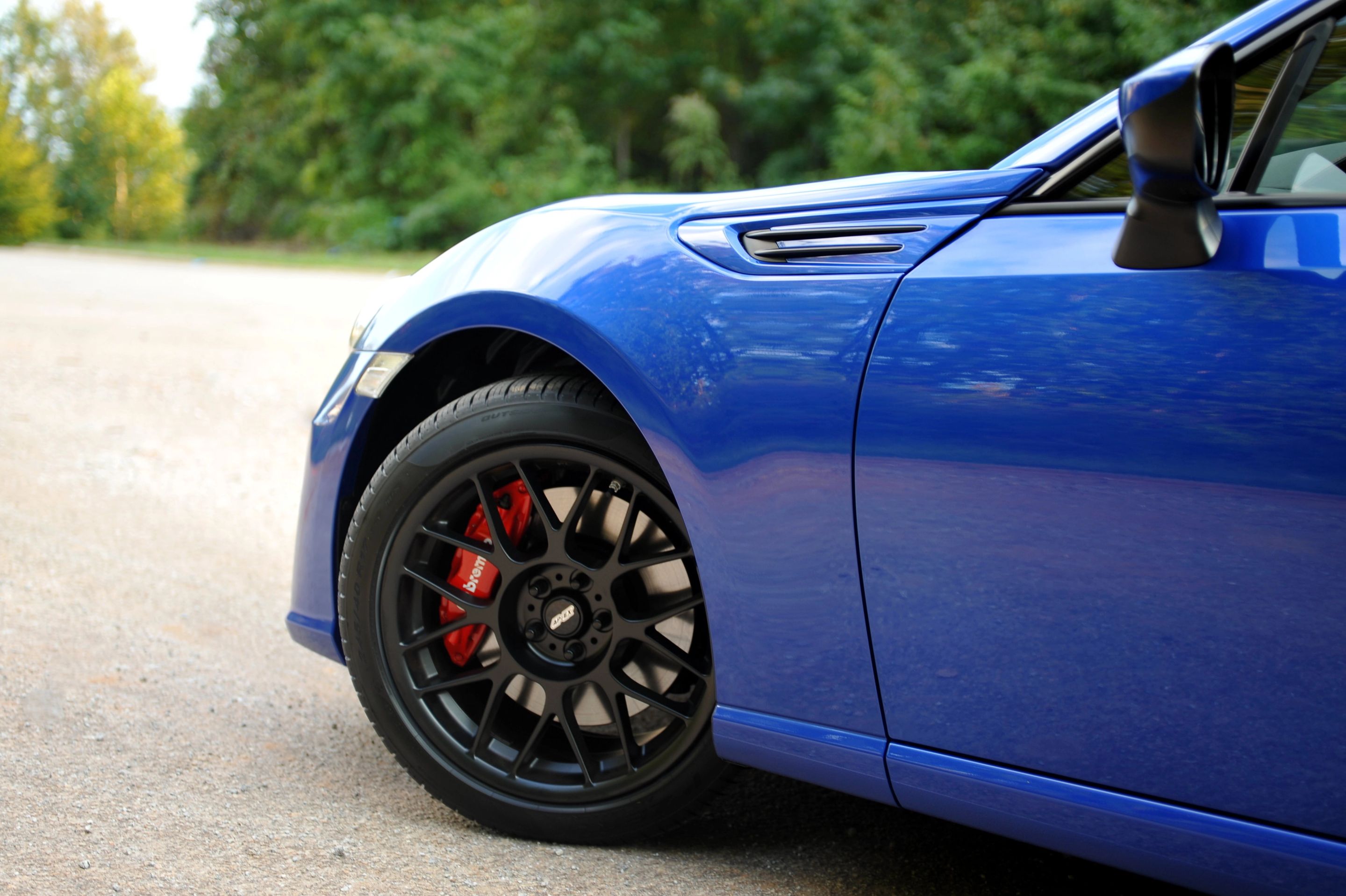 Blue Subaru ZC6 / Gen 1 BRZ with 17" ARC-8 Apex wheels in Satin Black