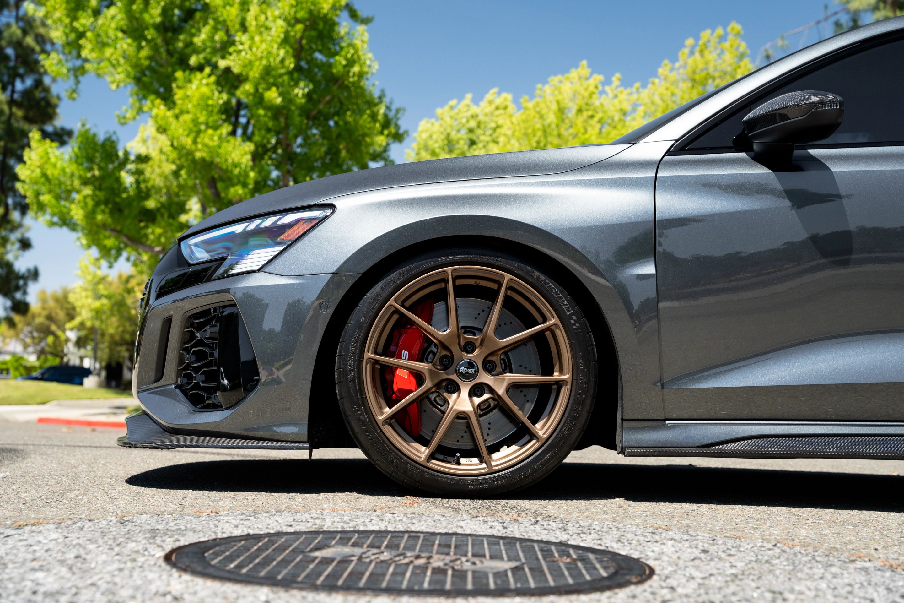 Grey Audi 8Y RS 3 with 18" VS-5 Apex wheels in Satin Bronze