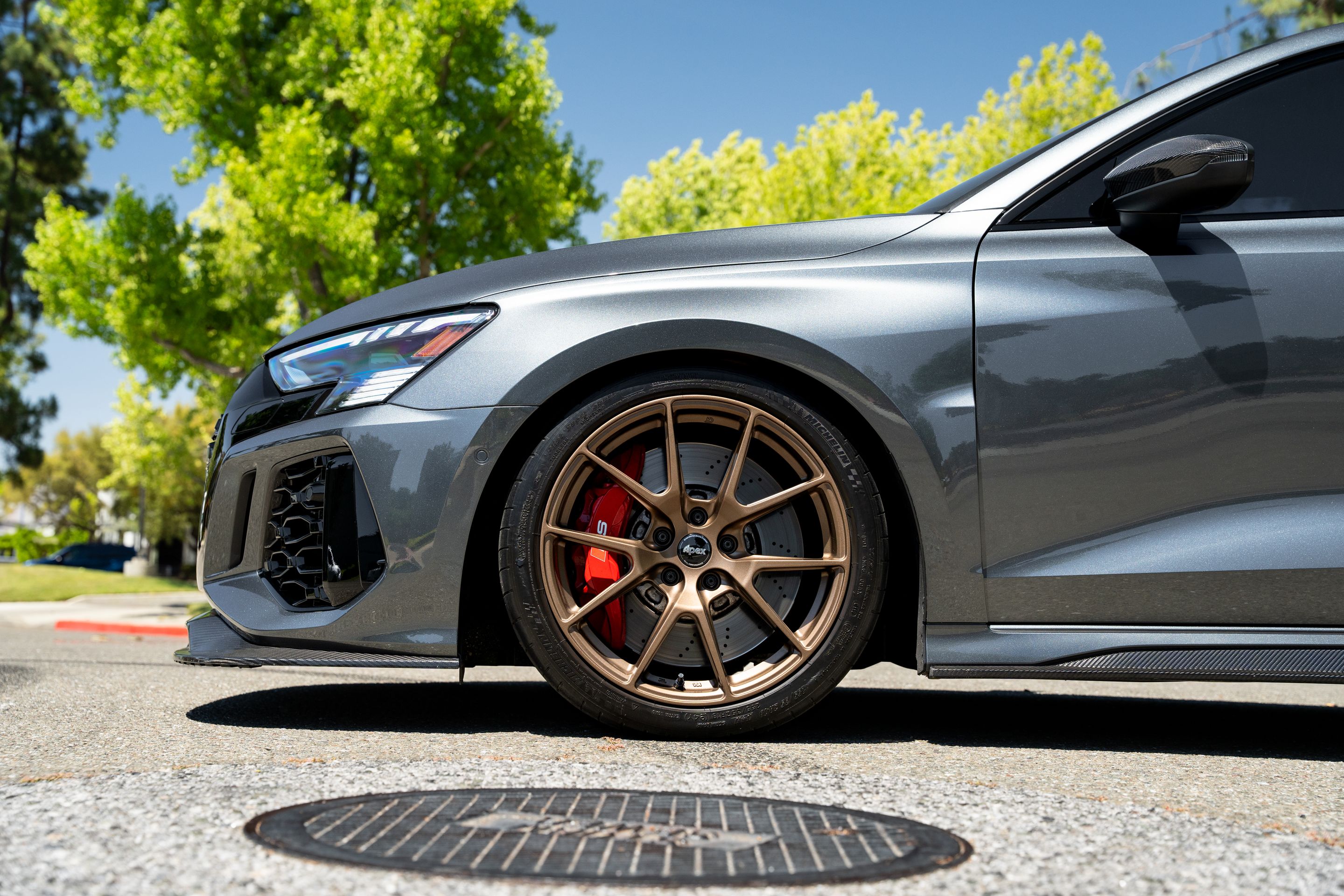 Grey Audi 8Y RS 3 with 18" VS-5 Apex wheels in Satin Bronze