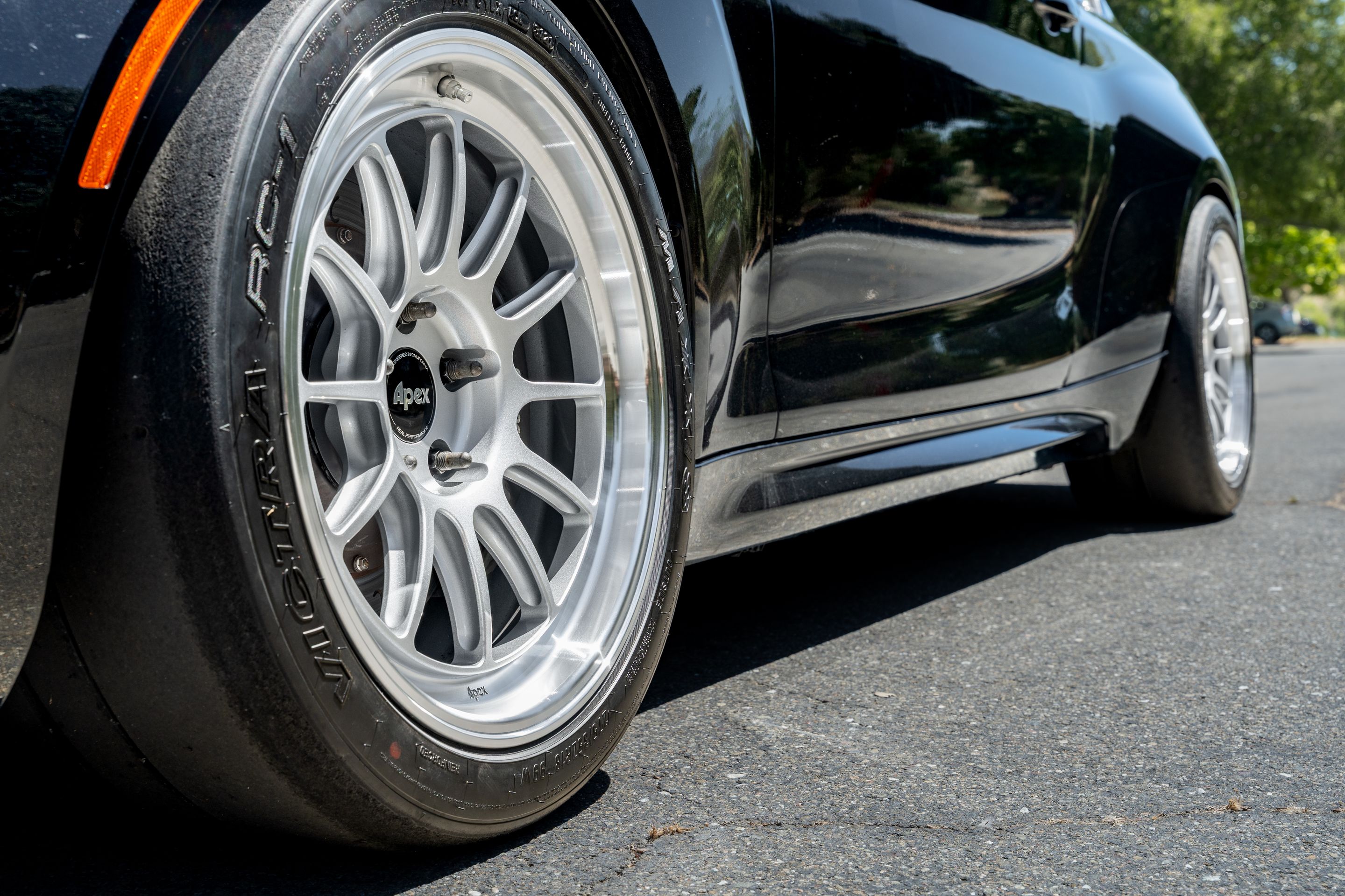 Black BMW F87 M2 with 18" SL-12RT Apex wheels in Machined Lip Race Silver