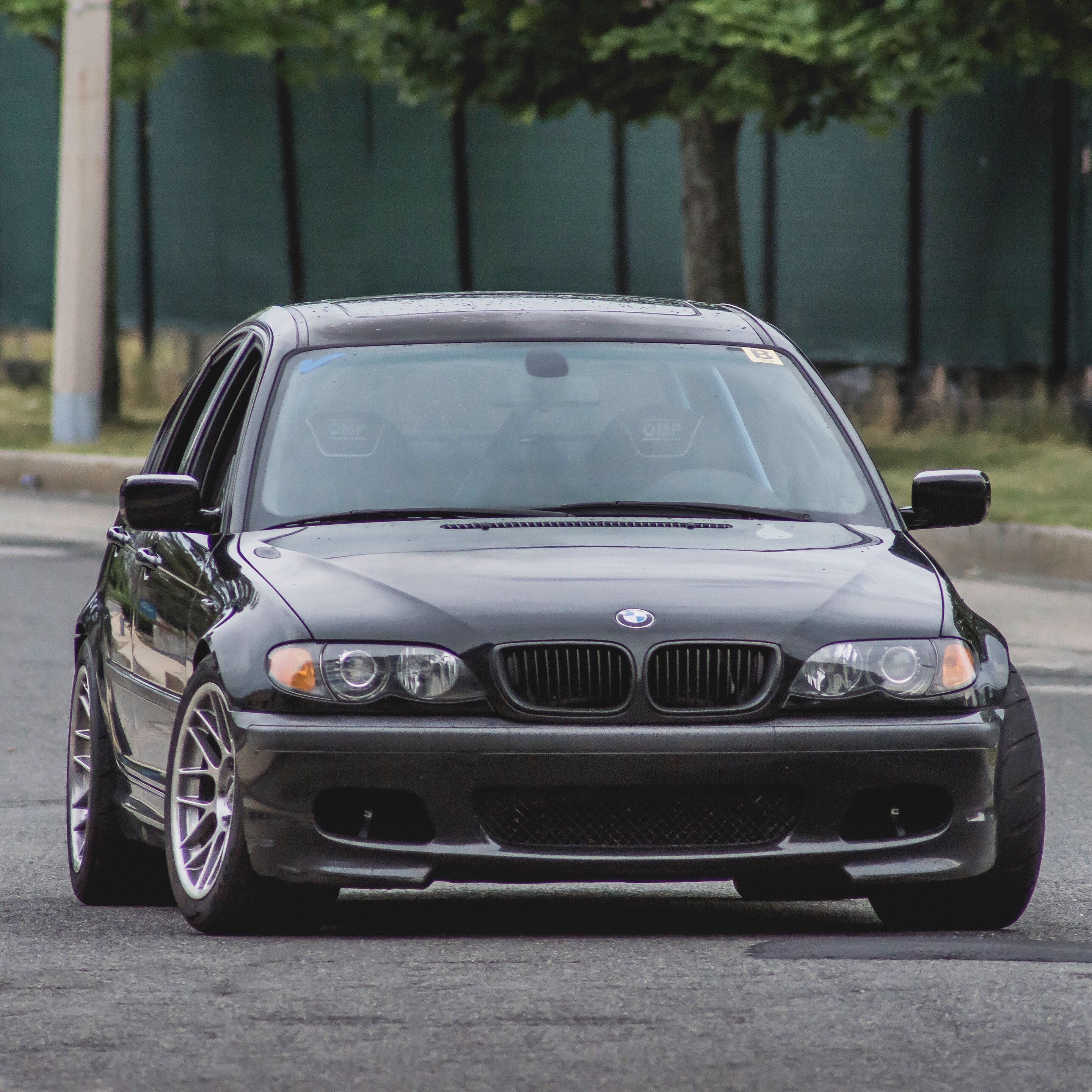 Black BMW E46 3 Series with 17" ARC-8 Apex wheels in Hyper Black
