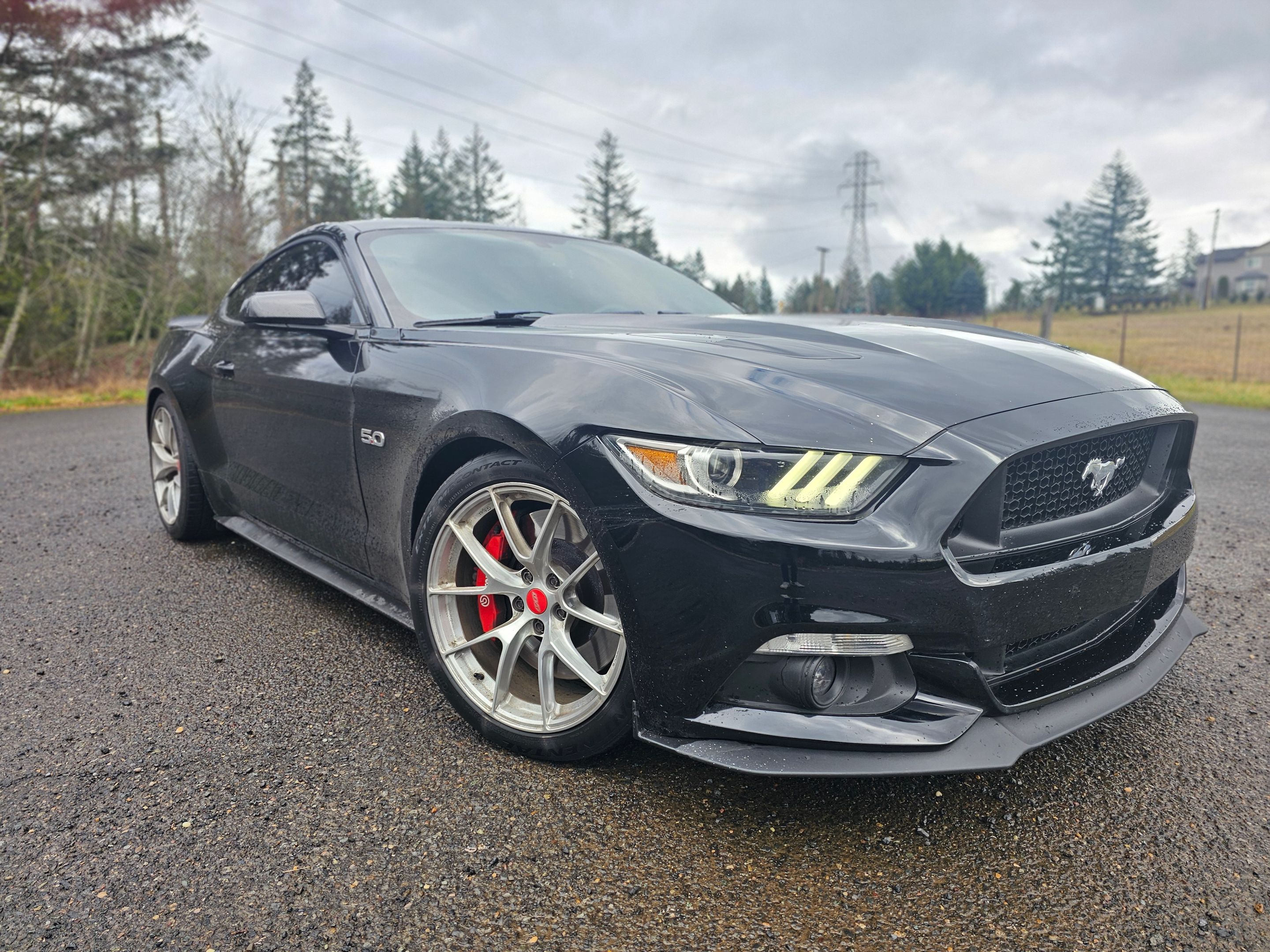 Black Ford S550 Mustang GT with 19" VS-5RS Apex wheels in Brushed Clear