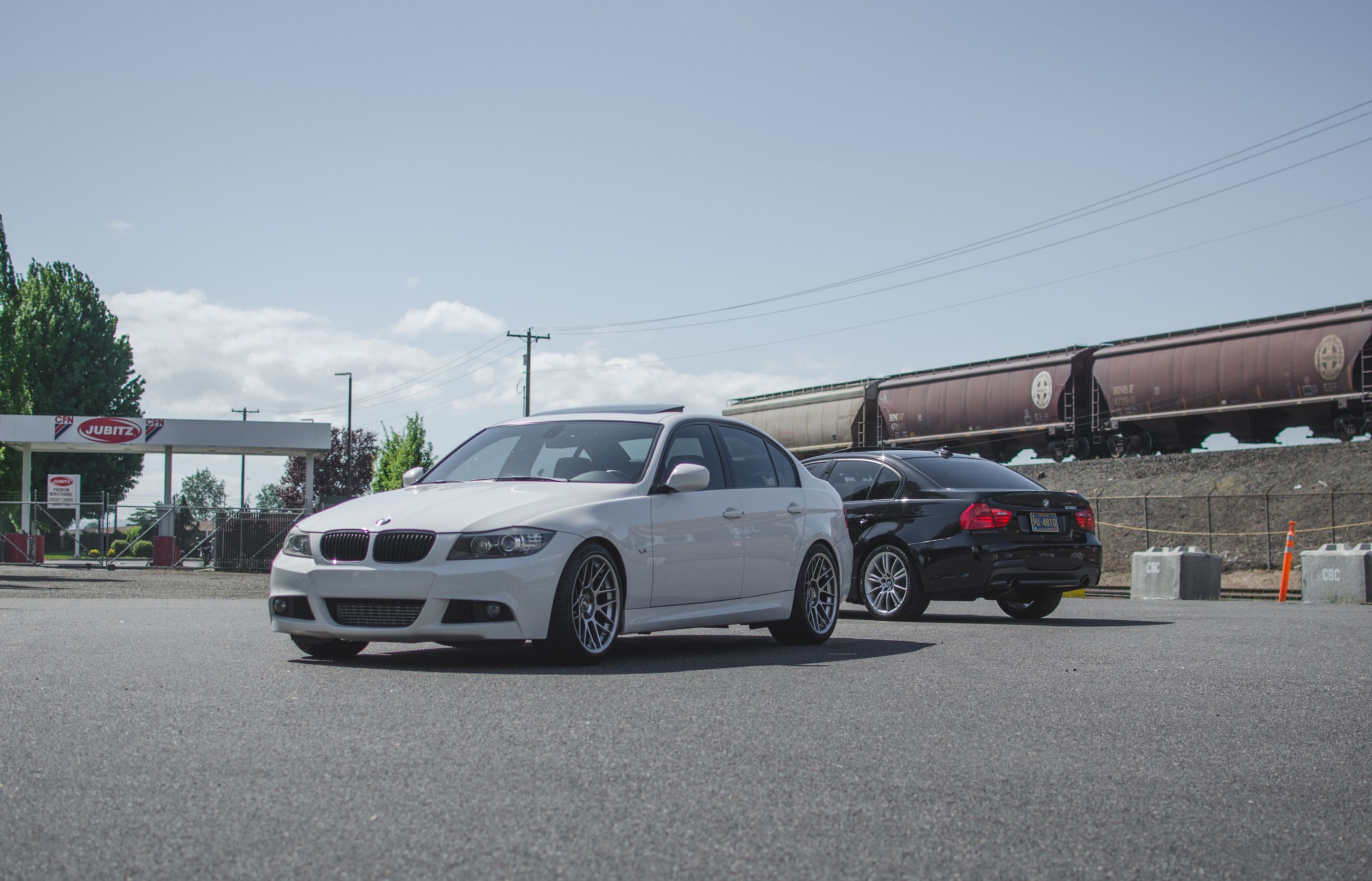 White BMW E90 LCI Sedan 3 Series with 18" ARC-8 Apex wheels in Hyper Black