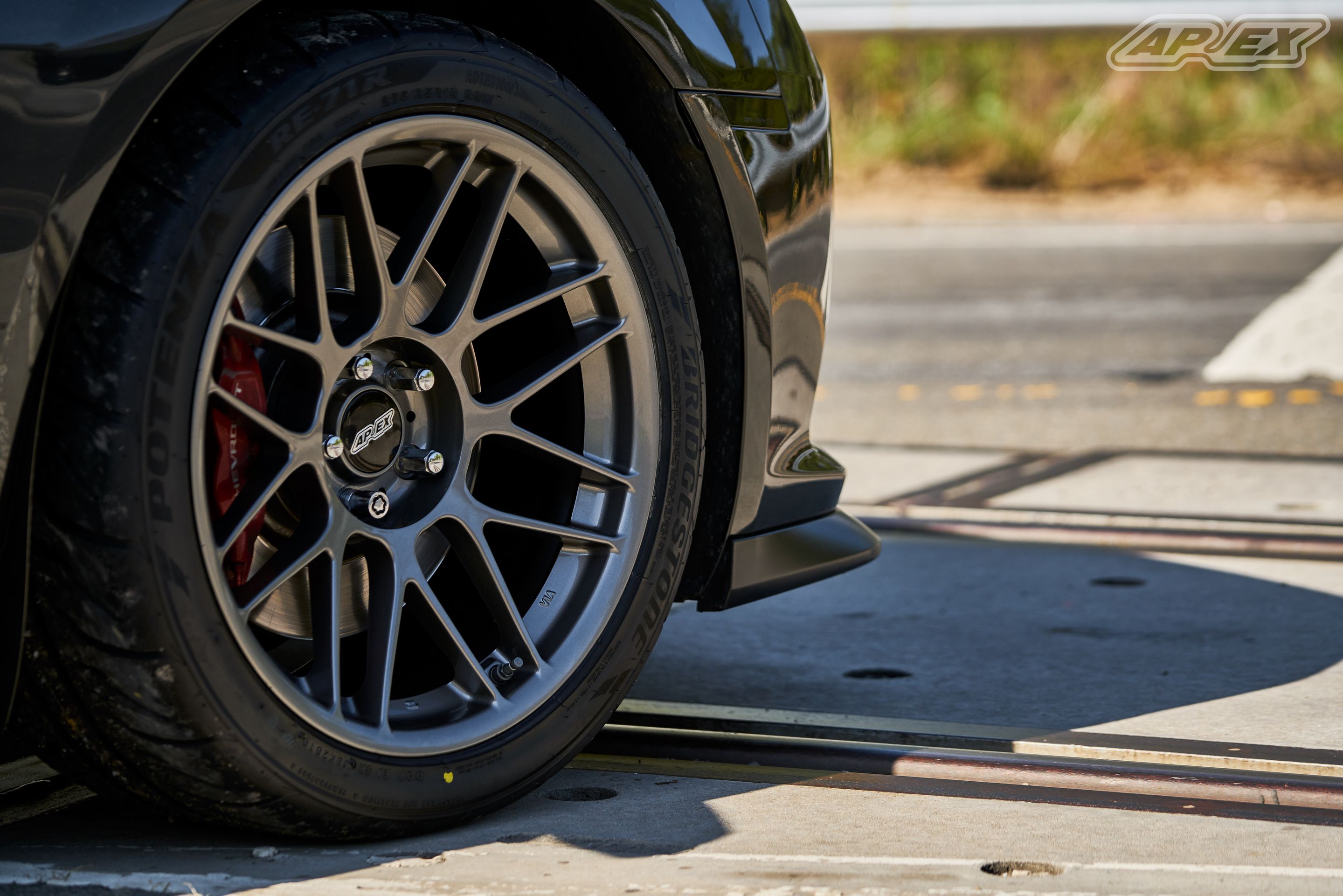 Grey Chevrolet 5th Gen Camaro RS with 19" ARC-8 Apex wheels in Anthracite
