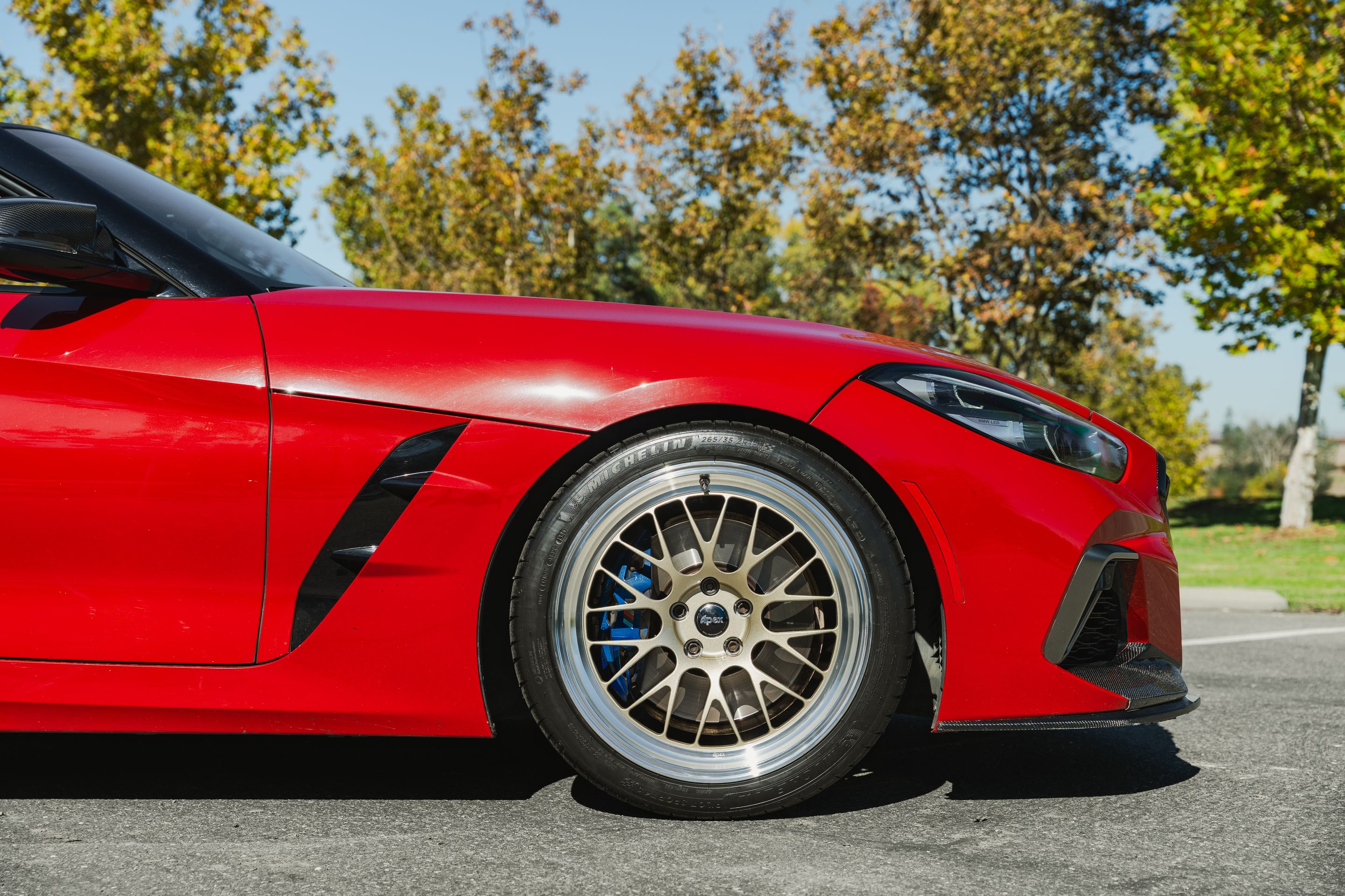 Red BMW G29 Z4 with 19" ML-10RT Apex wheels in Machined Lip Gloss Motorsport Gold