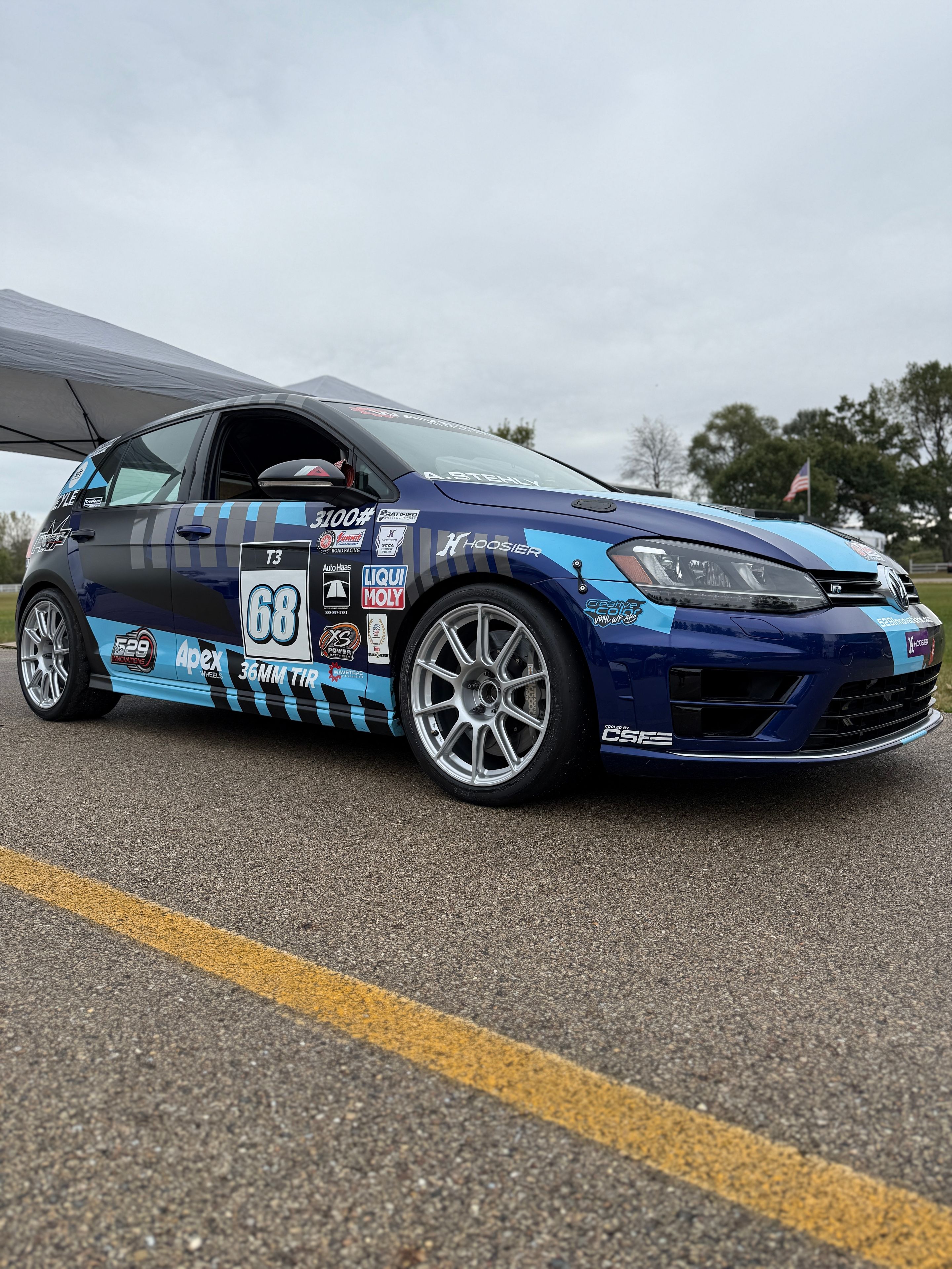 Race Livery VW MK7 Golf R with 18" SM-10 Apex wheels in Race Silver