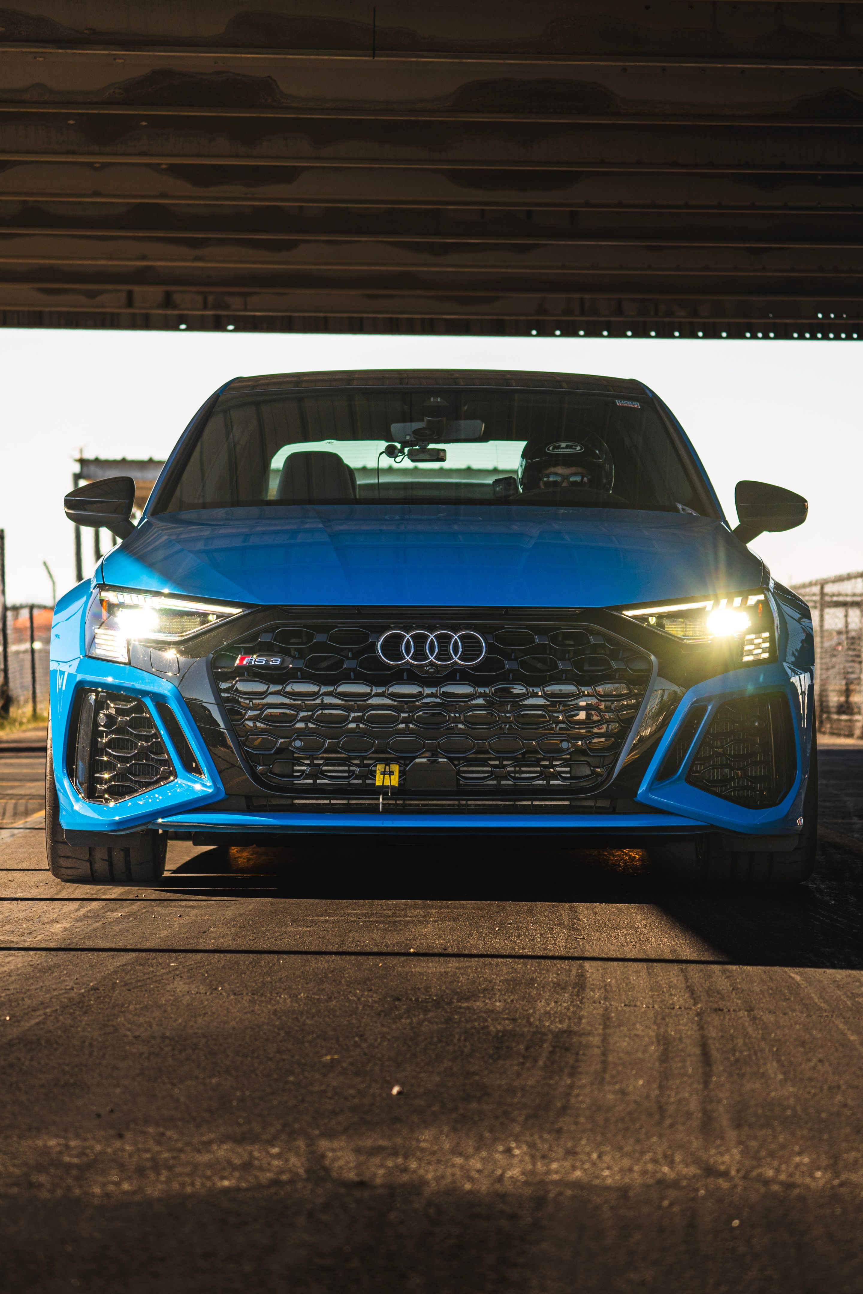 Blue Audi 8Y RS 3 with 18" VS-5RS Apex wheels in Brushed Clear
