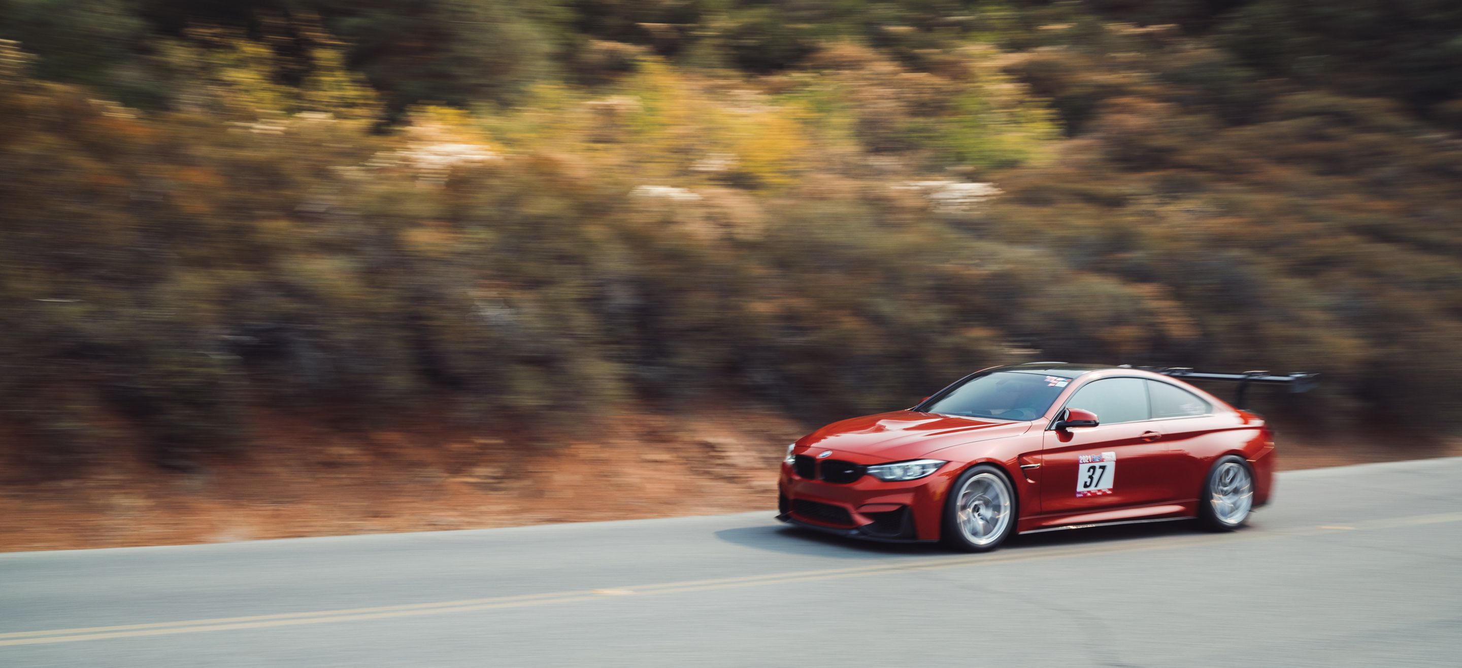 Orange BMW F82 Coupe M4 with 18" VS-5RS Apex wheels in Brushed Clear