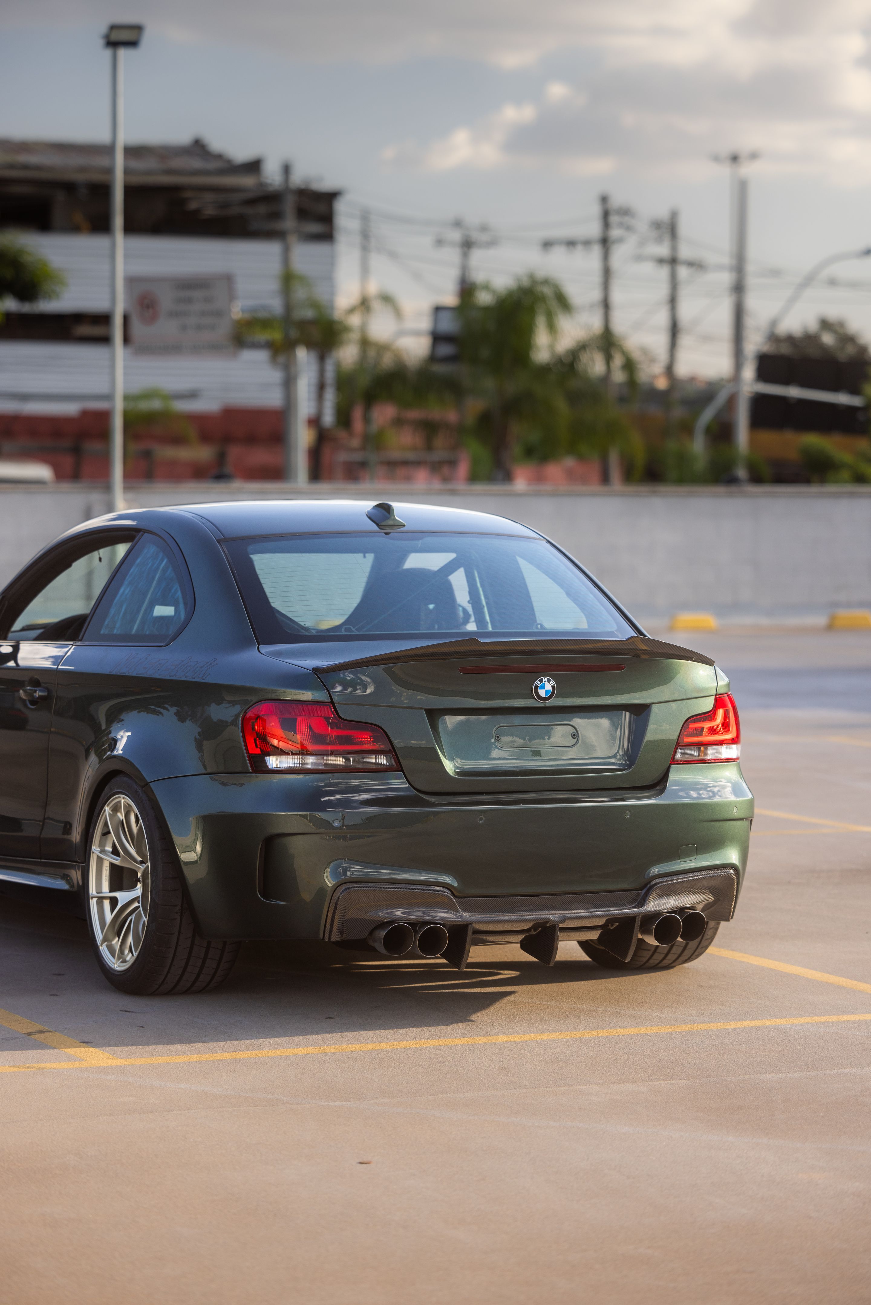 Green BMW E82 1M with 18" VS-5RS Apex wheels in Motorsport Gold