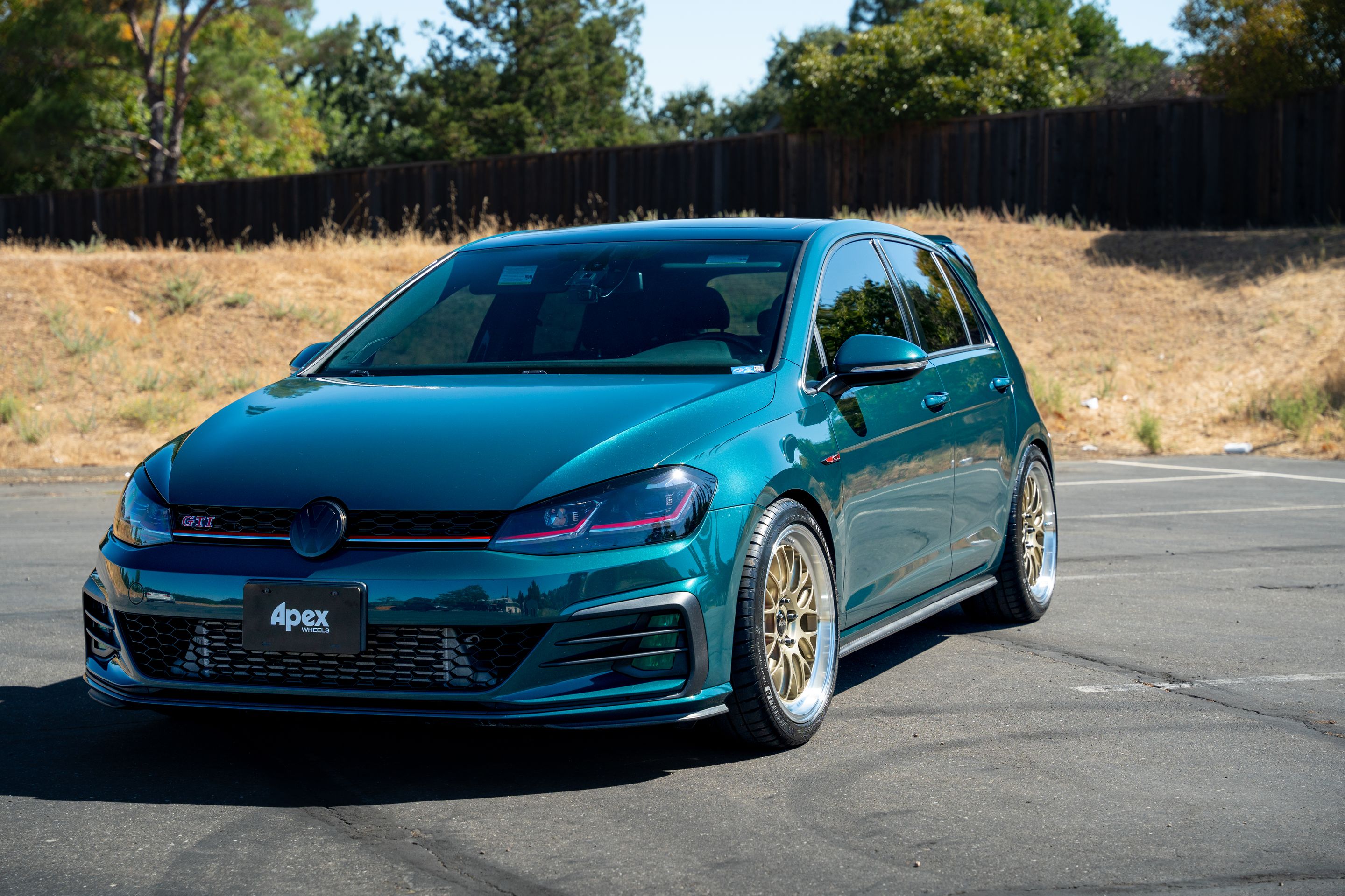 Green VW MK7 GTI with 18" ML-10RT Apex wheels in Machined Lip Gloss Motorsport Gold