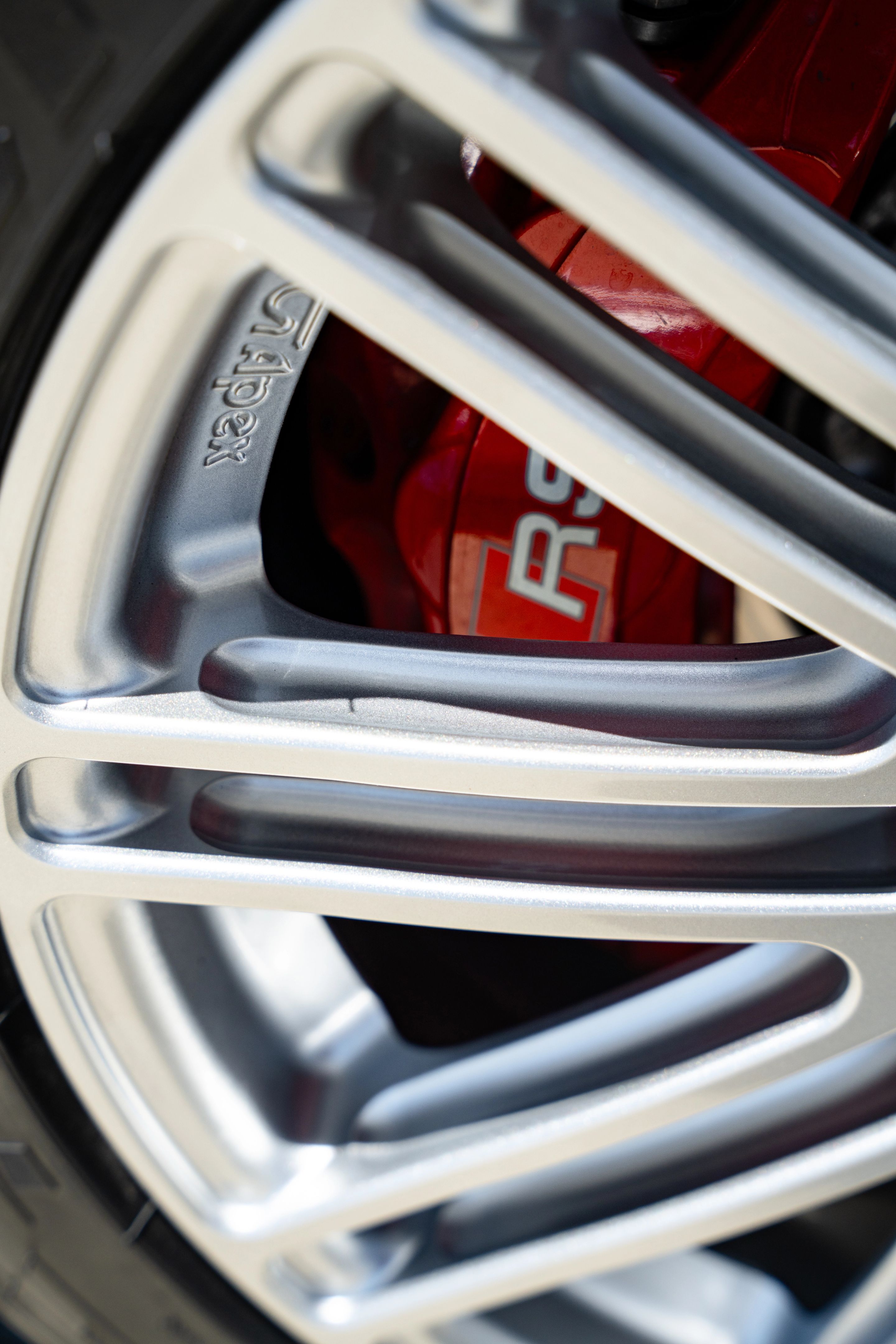 Grey Audi 8Y RS 3 with 18" TC-10RT Apex wheels in Race Silver