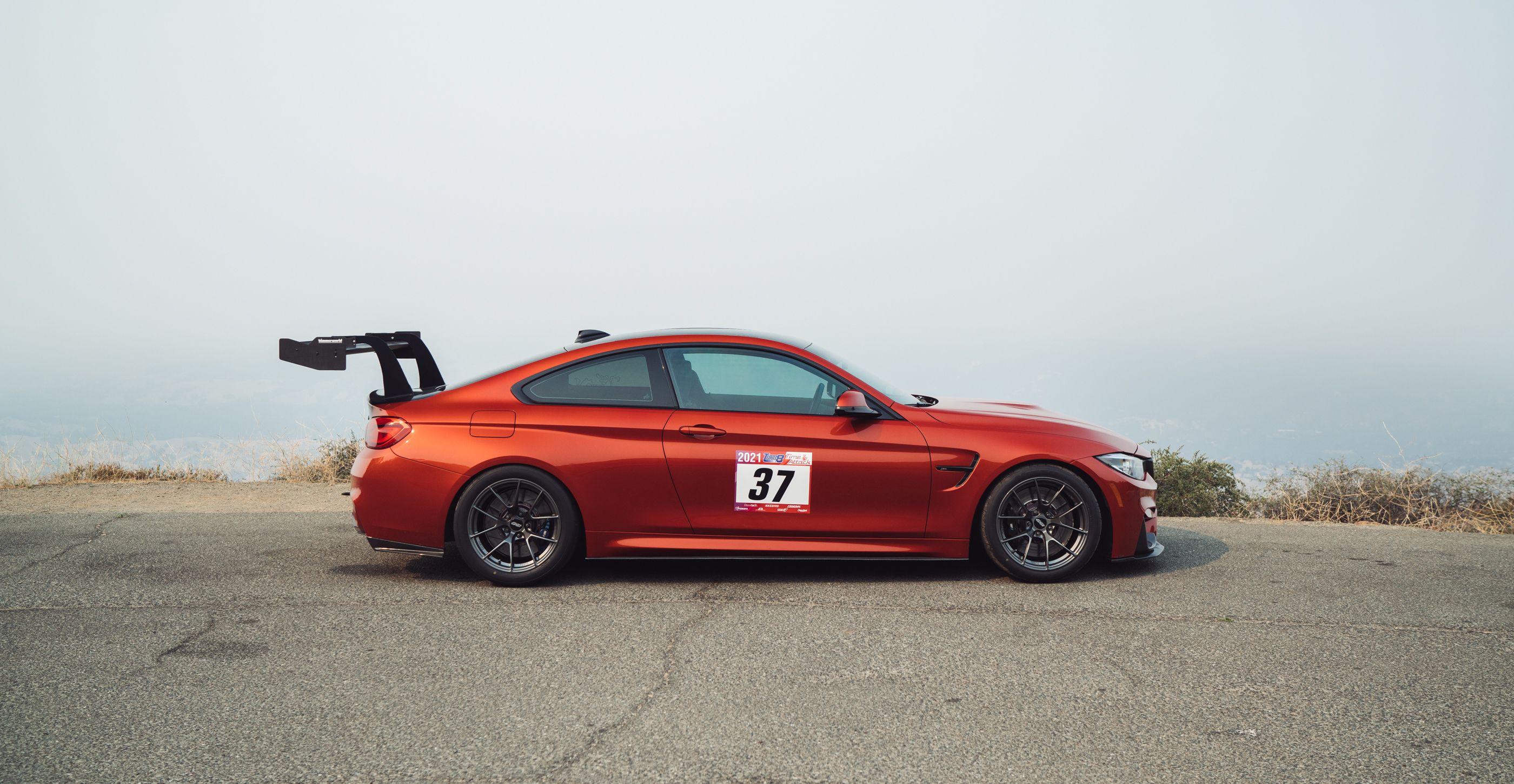 Orange BMW F82 Coupe M4 with 18" VS-5RS Apex wheels in Anthracite